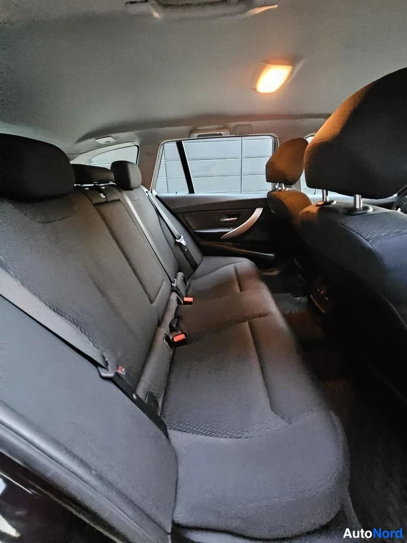 Musta BMW 320i xDrive 2015, takaistuimet, kuva 18