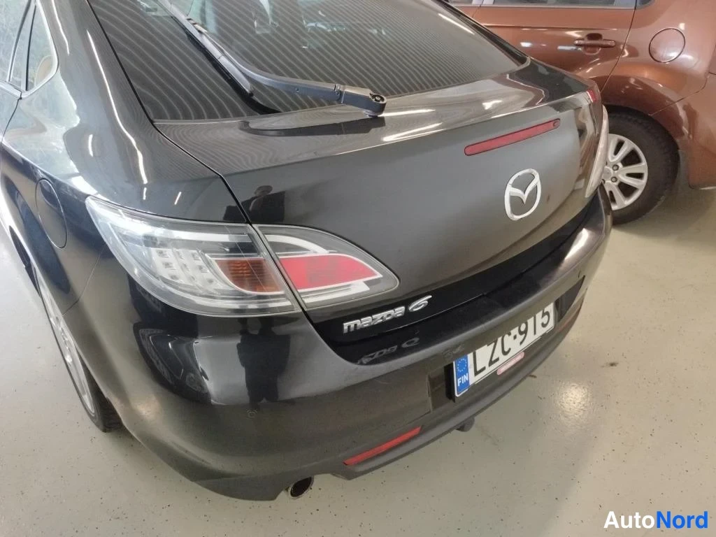 Musta Mazda 6 2010, takaviisto, kuva 7