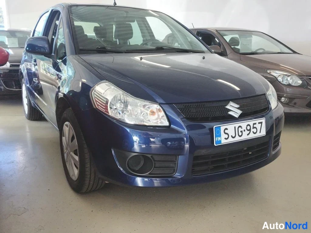 Sininen Suzuki SX4 2006, etuviisto, keula oikealle, kuva 2