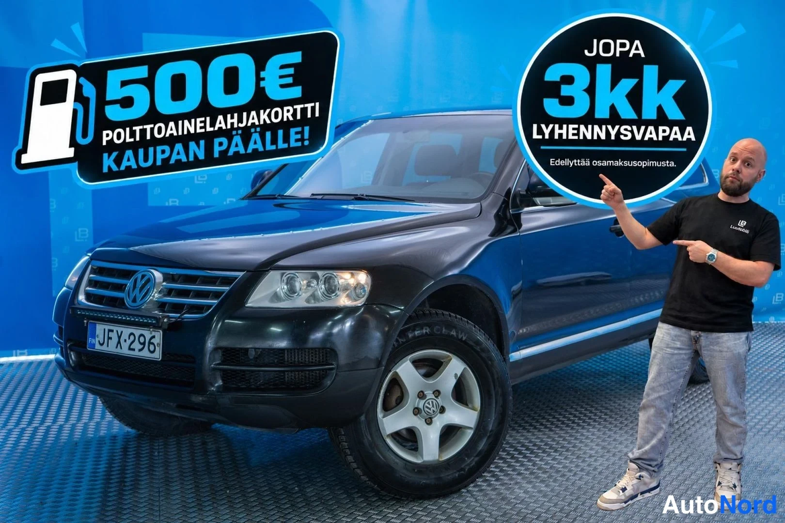 Musta Volkswagen Touareg 2005, etuviisto, keula vasemmalle, kuva 2