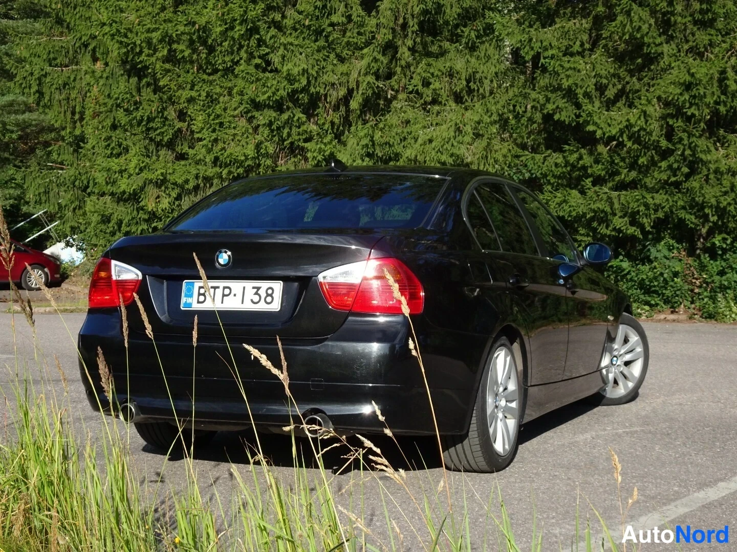 Musta BMW 335i 2007, takaviisto, kuva 12