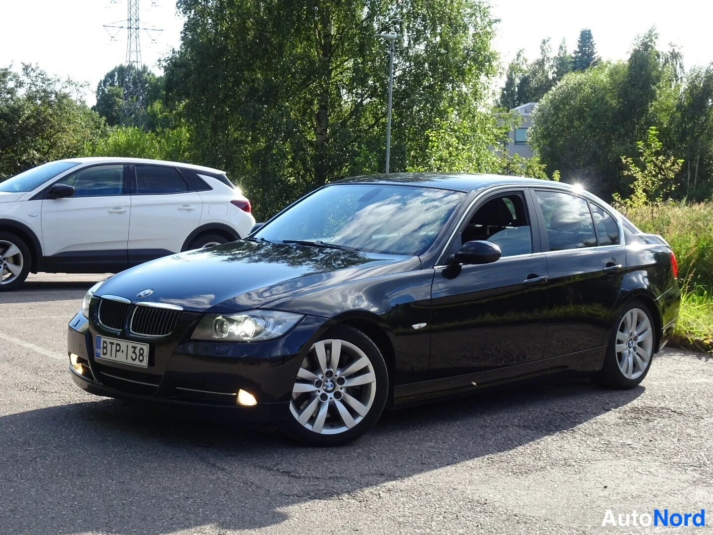 Musta BMW 335i 2007, etuviisto, keula vasemmalle, kuva 5