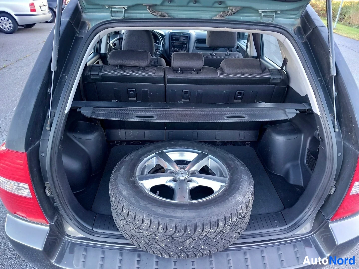 Vihreä Kia Sportage 2007, tavaratila, kuva 26