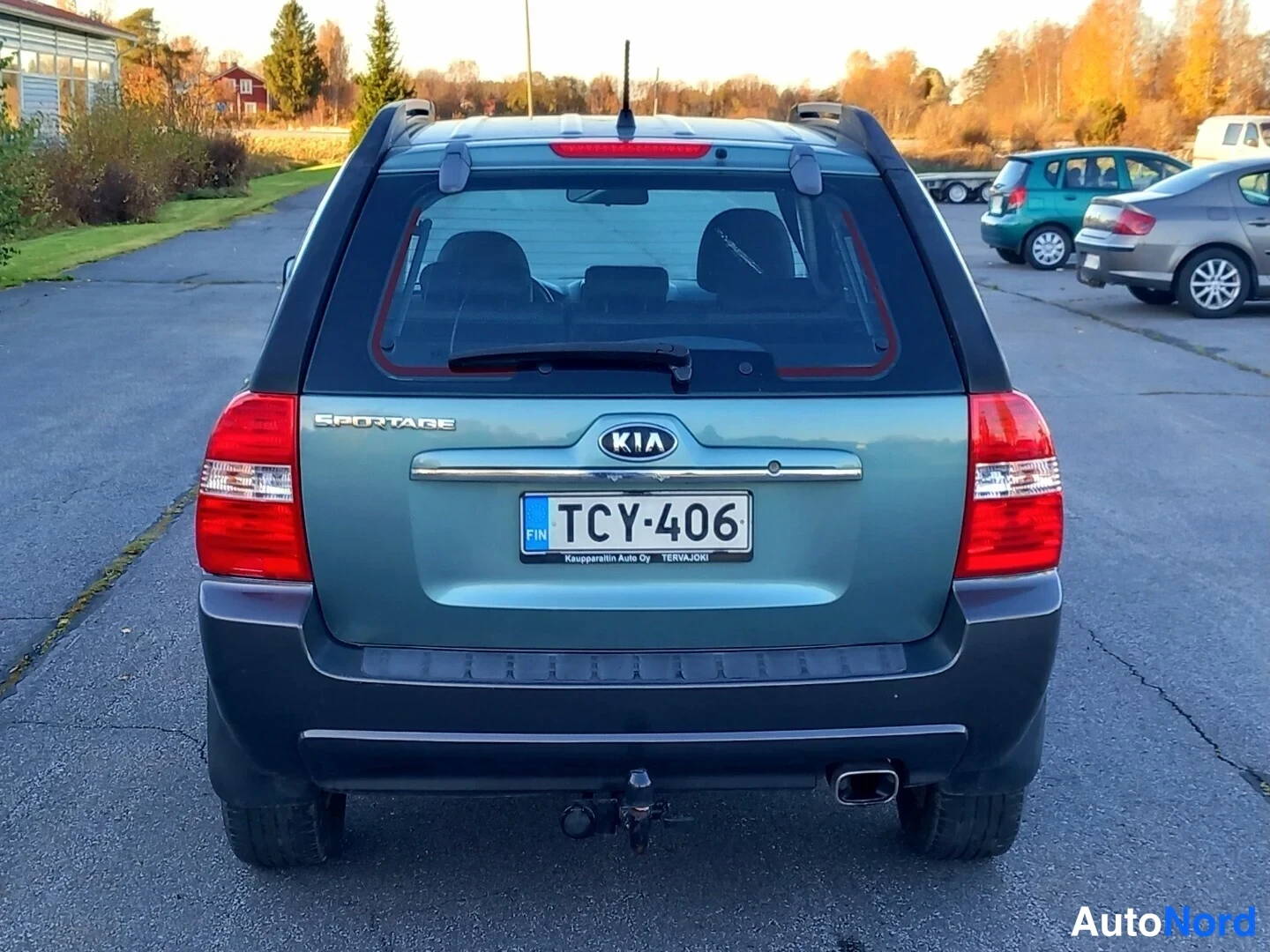 Vihreä Kia Sportage 2007, takaa, kuva 13