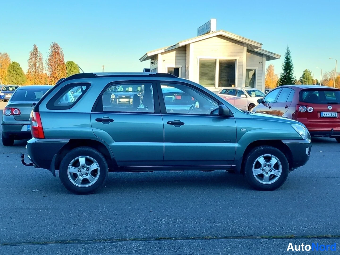 Vihreä Kia Sportage 2007, sivulta, kuva 8