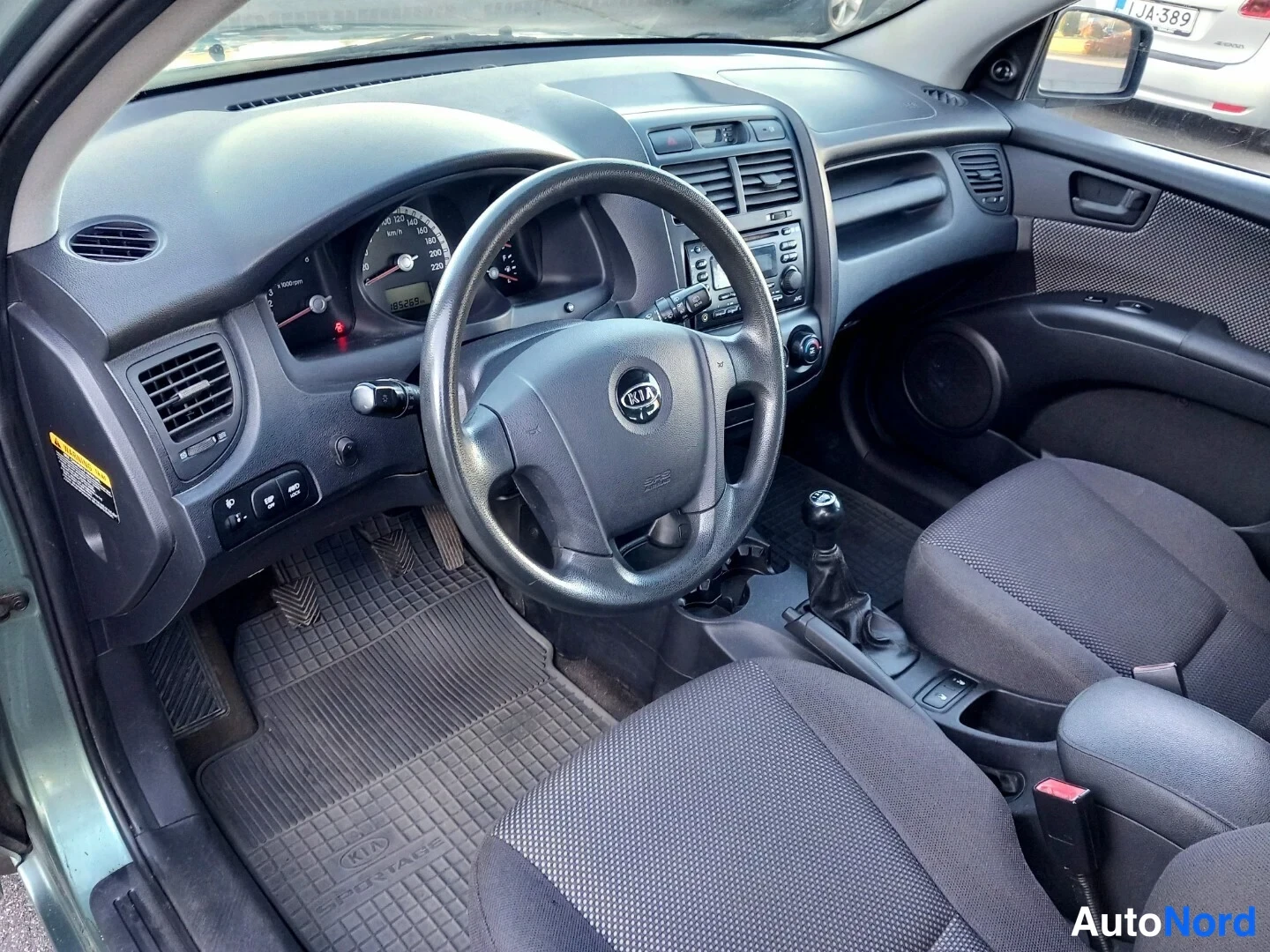 Vihreä Kia Sportage 2007, ohjaamo, kuva 14