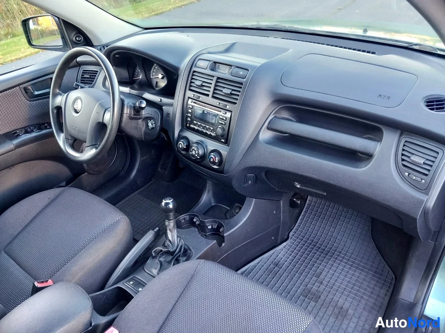 Vihreä Kia Sportage 2007, ohjaamo, kuva 16