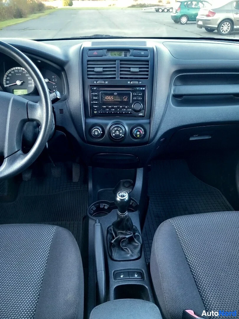 Vihreä Kia Sportage 2007, ohjaamo, kuva 19