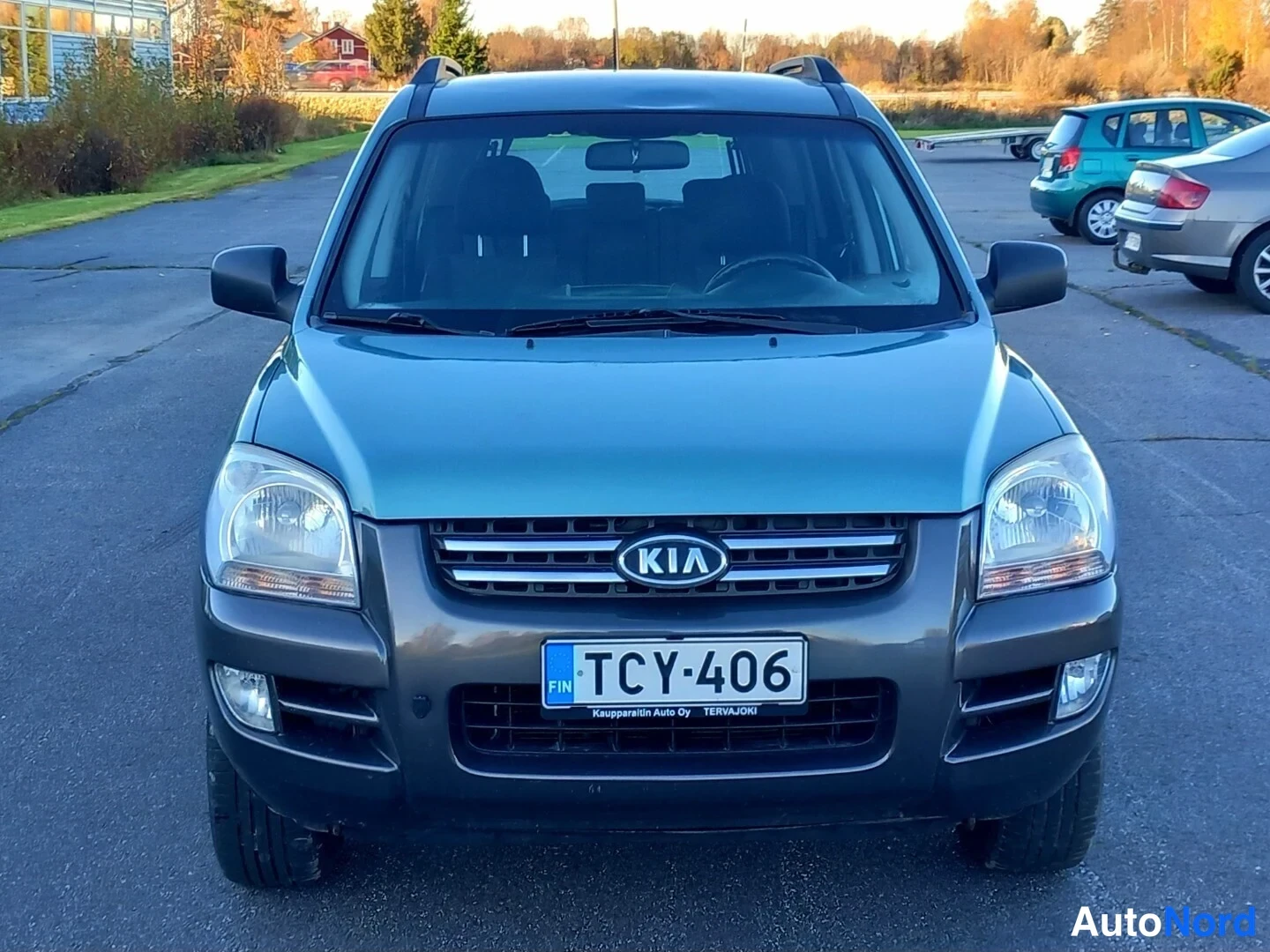 Vihreä Kia Sportage 2007, edestä, kuva 7