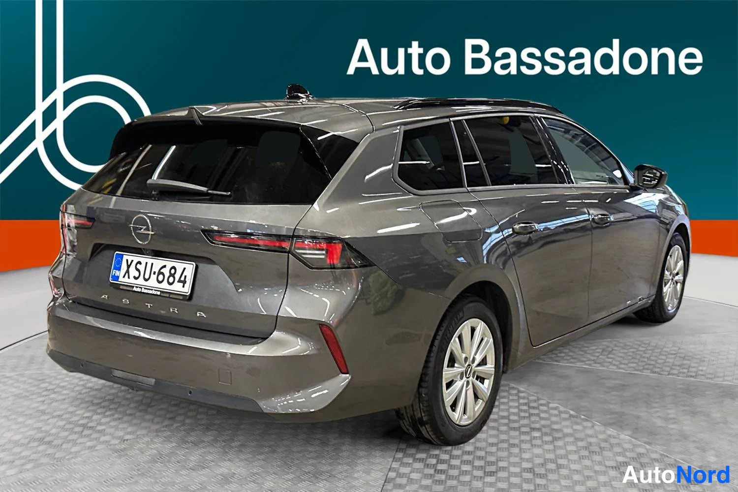 Harmaa Opel Astra Sports Tourer 2024, takaviisto, kuva 7