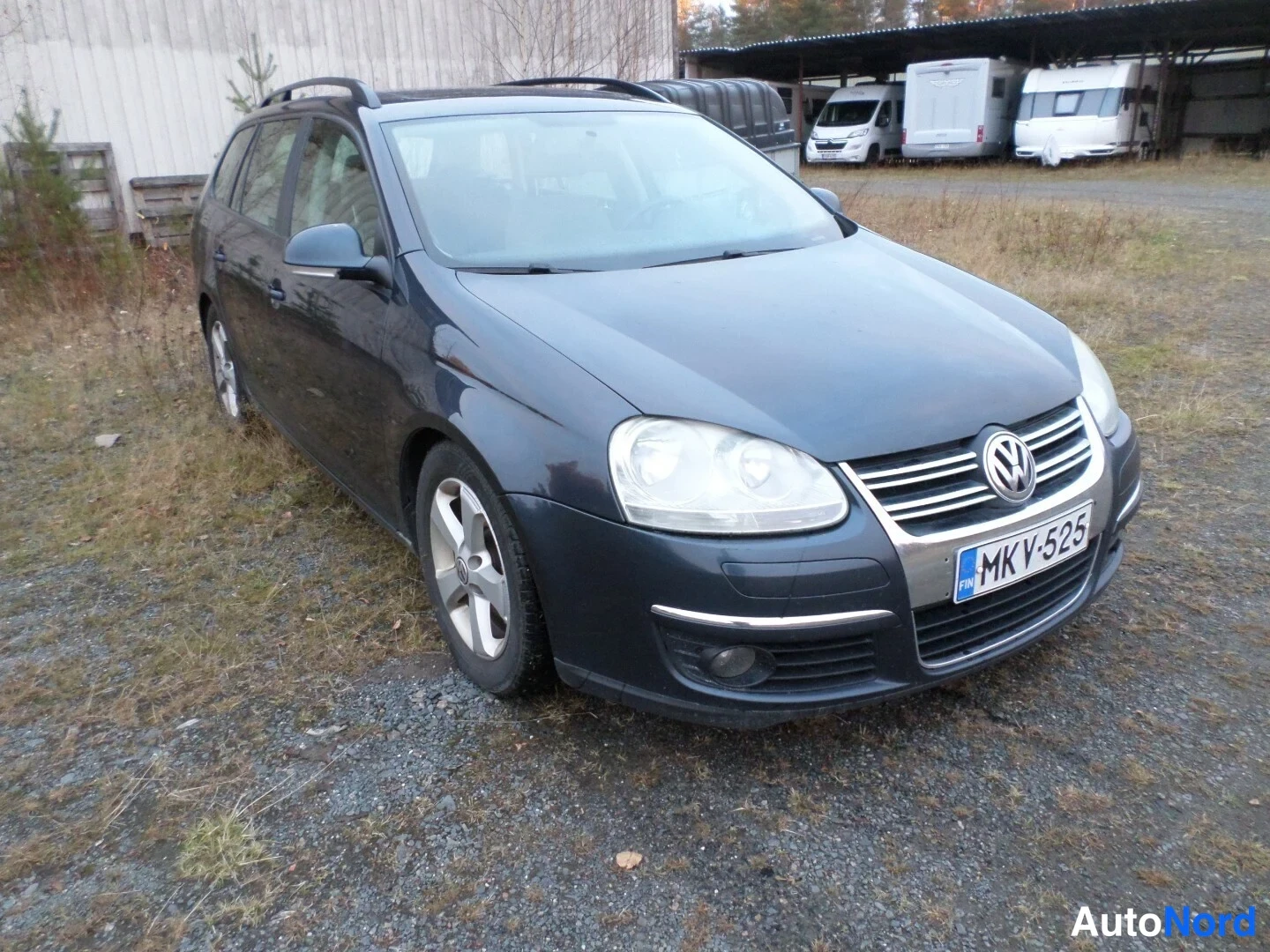 Sininen Volkswagen Golf Variant 2008, etuviisto, keula oikealle, kuva 2