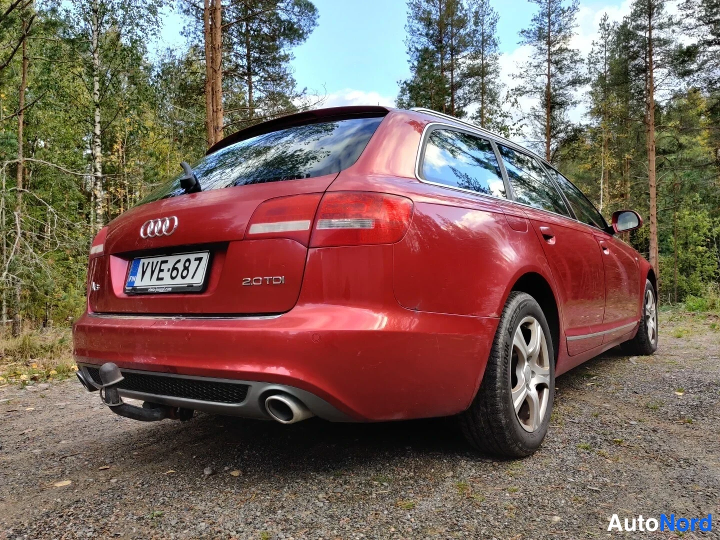 Röd Audi A6 Avant 2010, snett bakifrån, bild 14