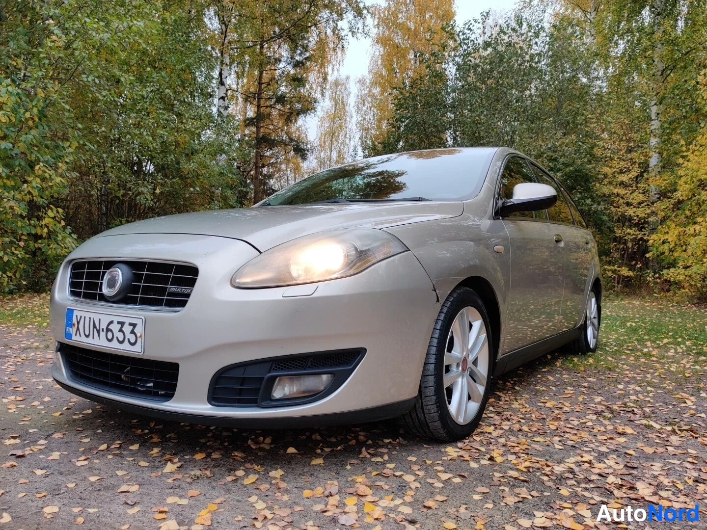 Beige Fiat Croma 2008, etuviisto, keula vasemmalle, kuva 2