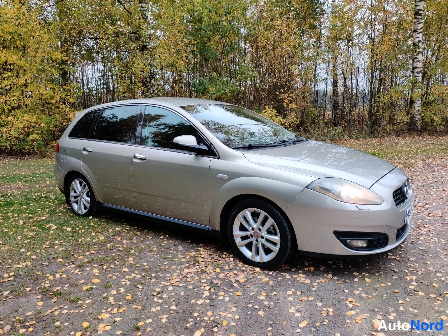 Beige Fiat Croma 2008, etuviisto, keula oikealle, kuva 9