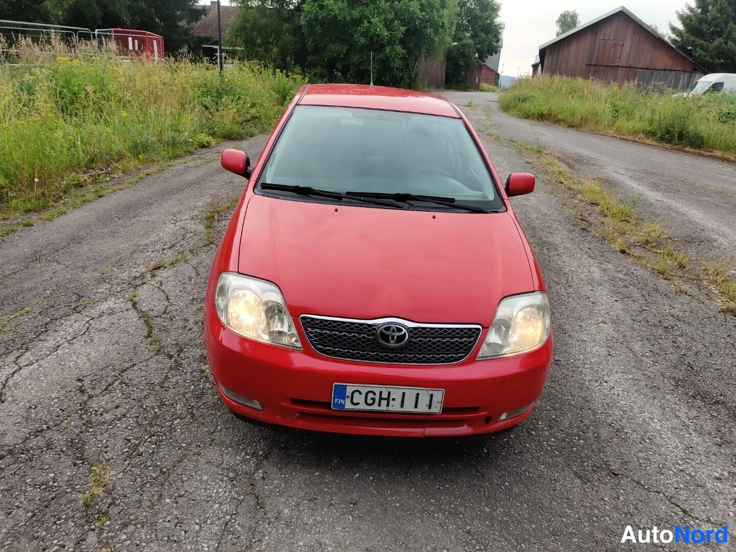Punainen Toyota Corolla 2004, edestä, kuva 10