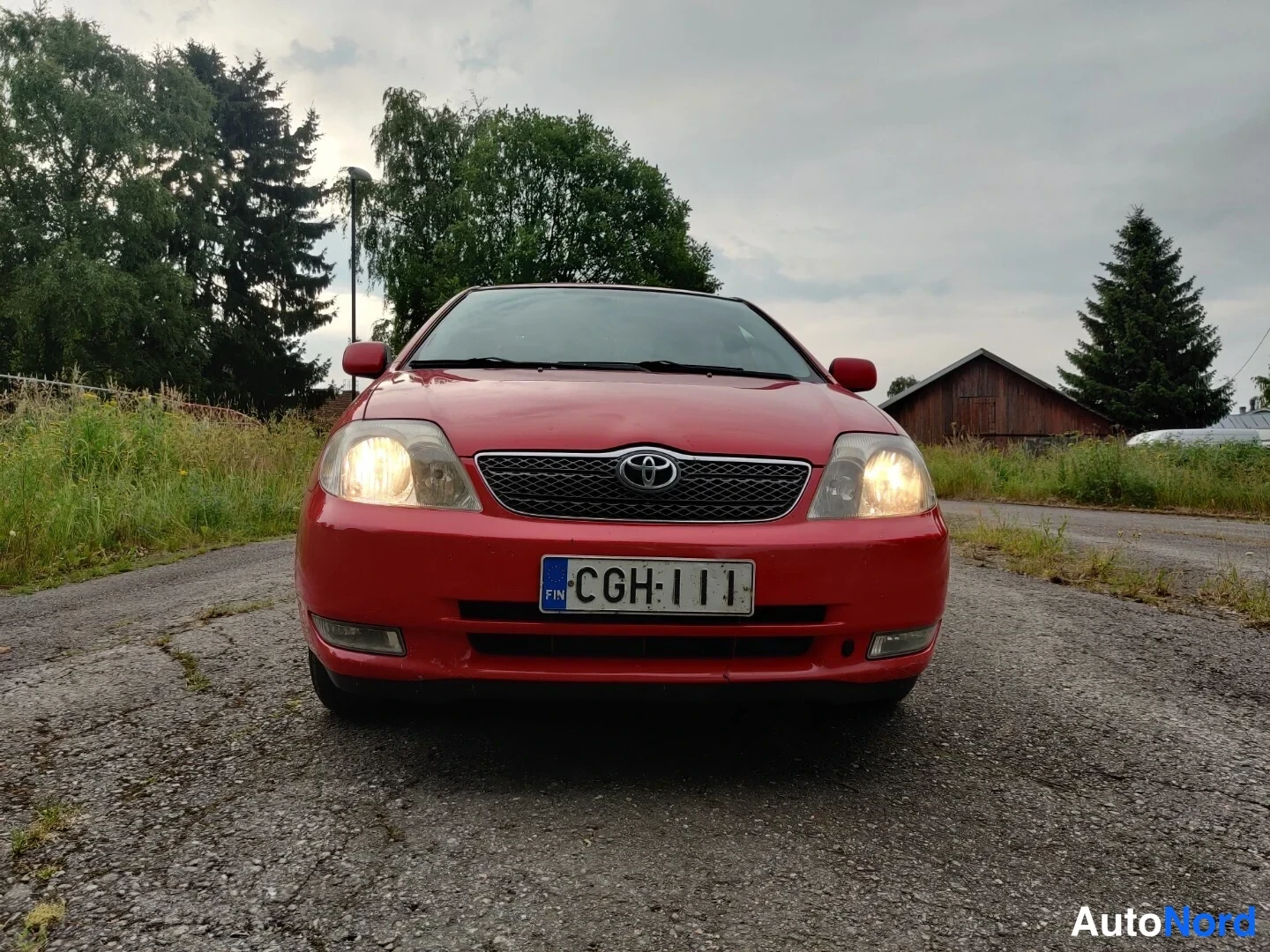Punainen Toyota Corolla 2004, edestä, kuva 11