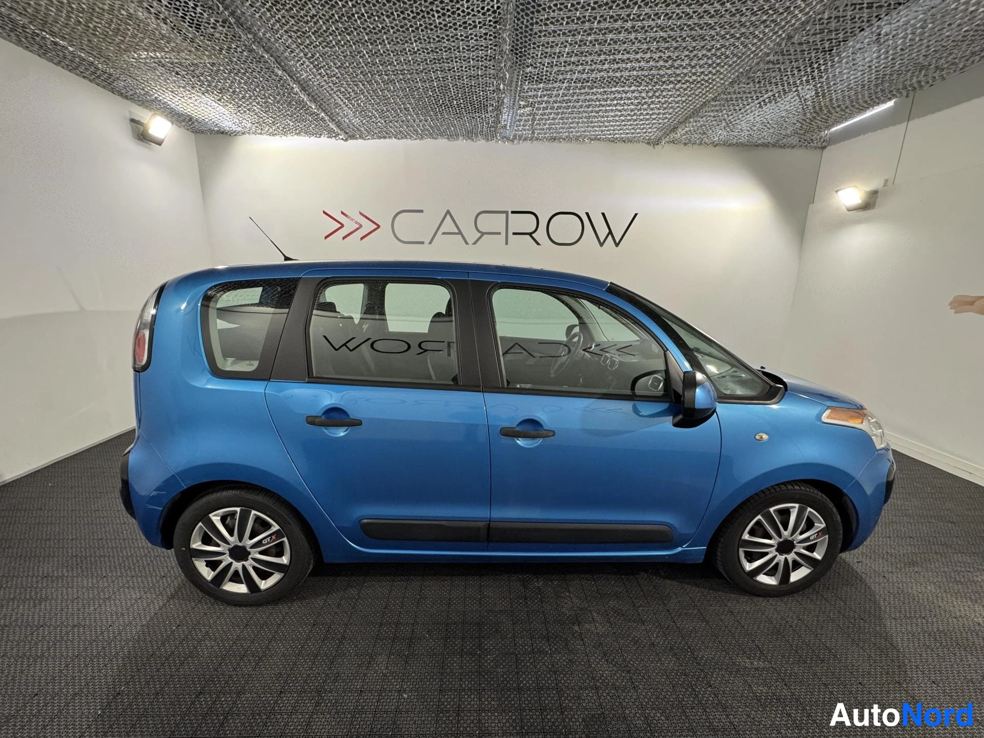 Sininen Citroen C3 Picasso 2010, etuviisto, keula oikealle, kuva 3