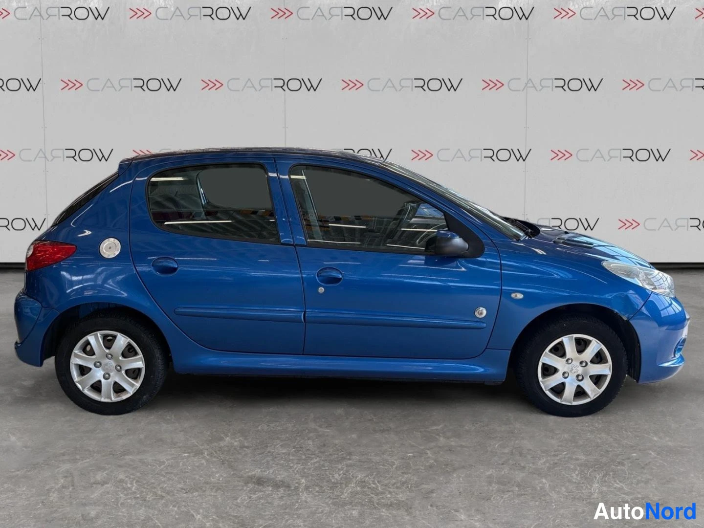 Sininen Peugeot 206+ 2012, sivulta, kuva 5