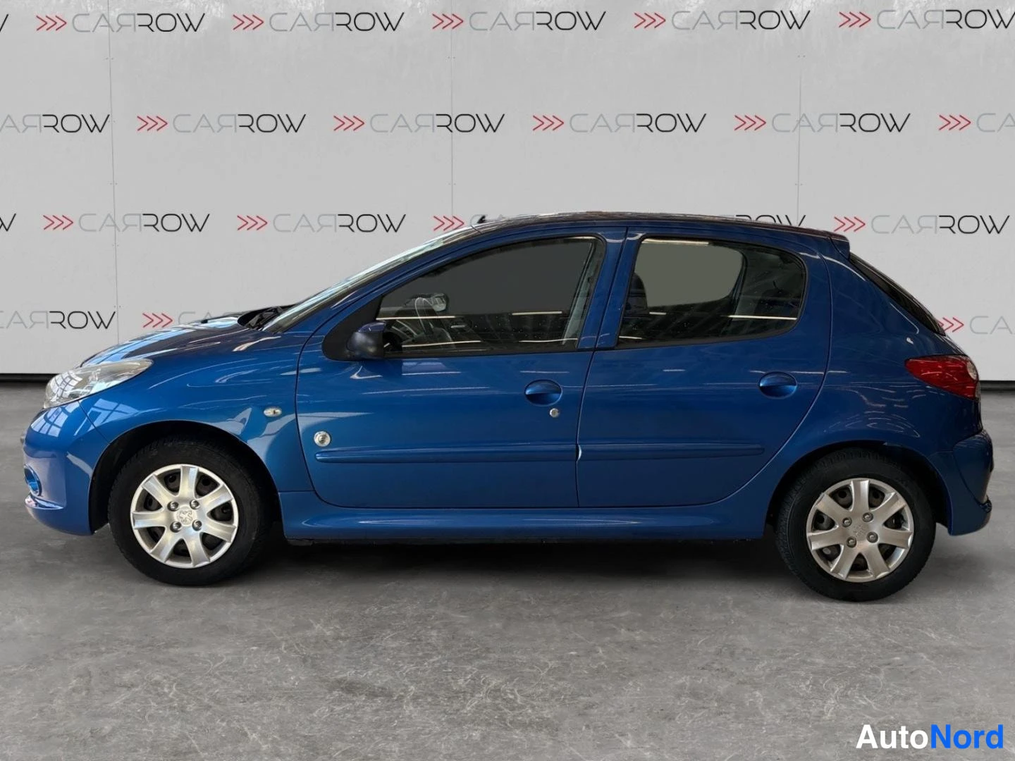 Sininen Peugeot 206+ 2012, sivulta, kuva 4
