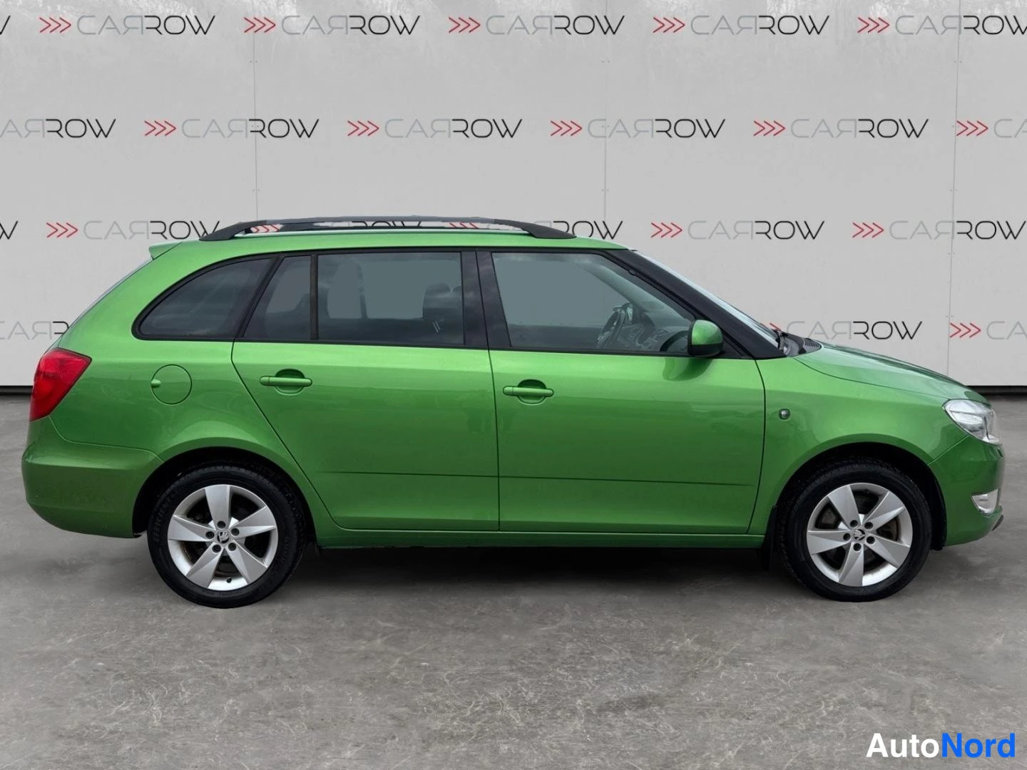 Vihreä Skoda Fabia 2014, sivulta, kuva 5