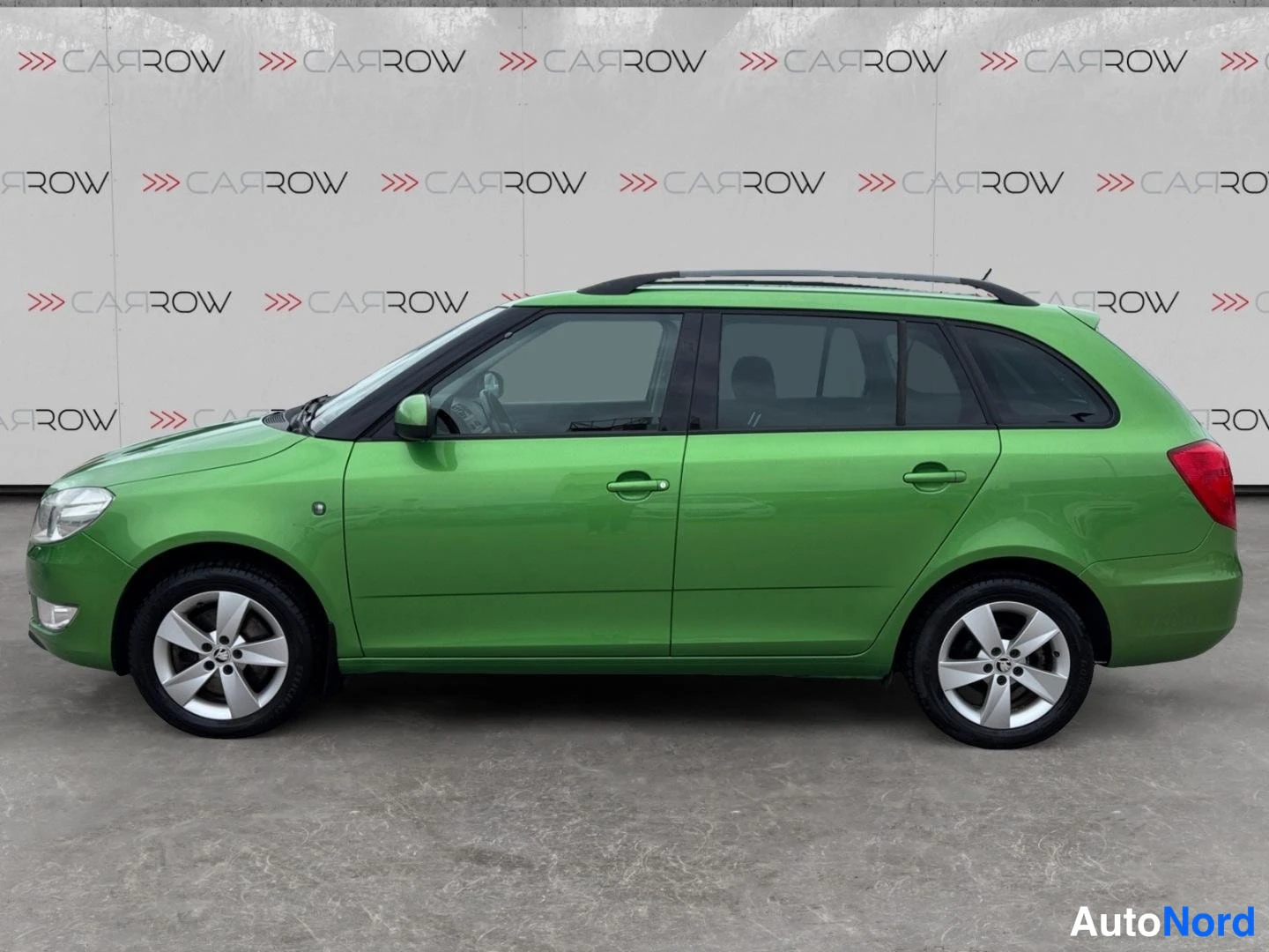 Vihreä Skoda Fabia 2014, etuviisto, keula vasemmalle, kuva 2