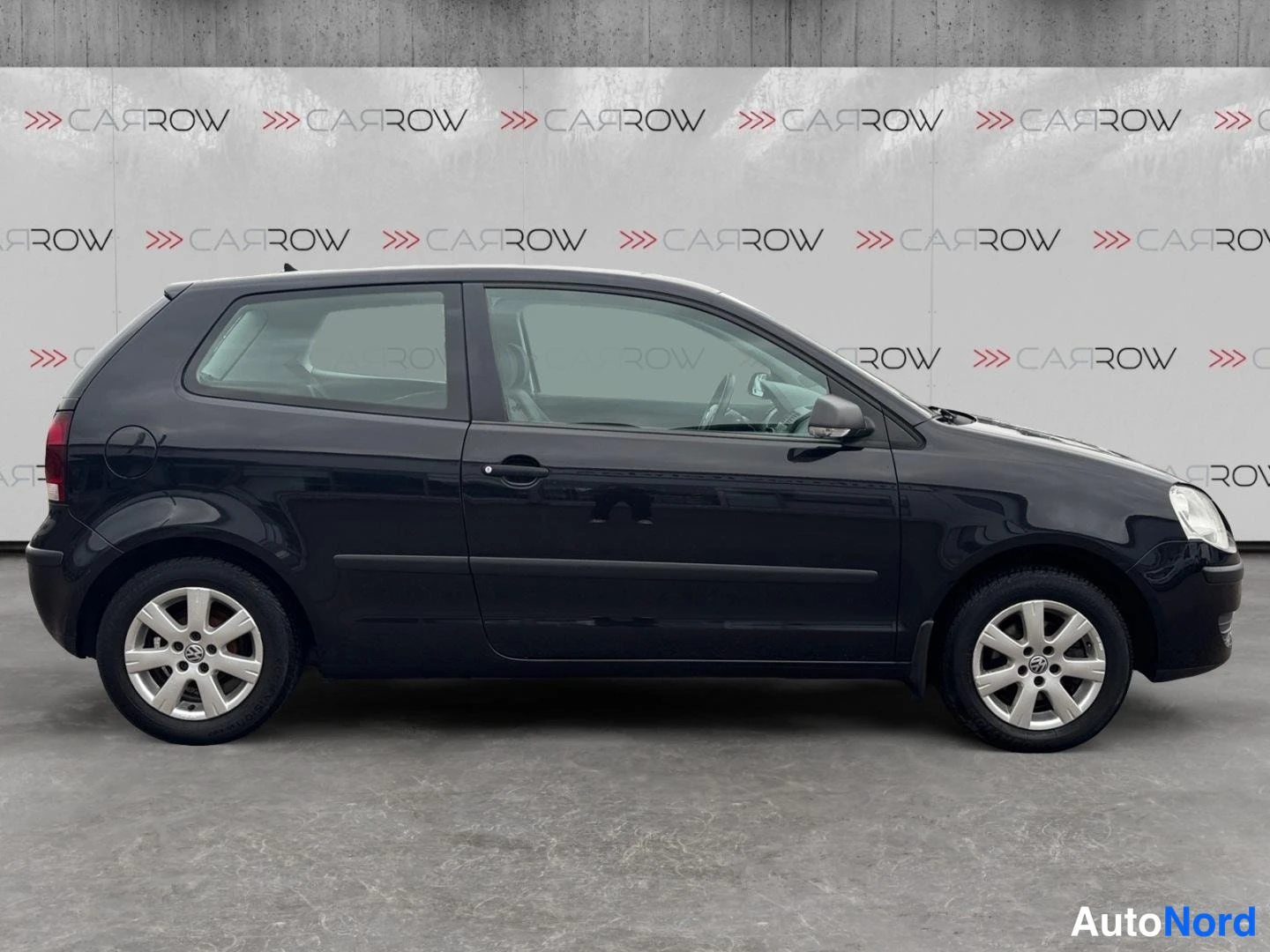 Musta Volkswagen Polo 2008, sivulta, kuva 5
