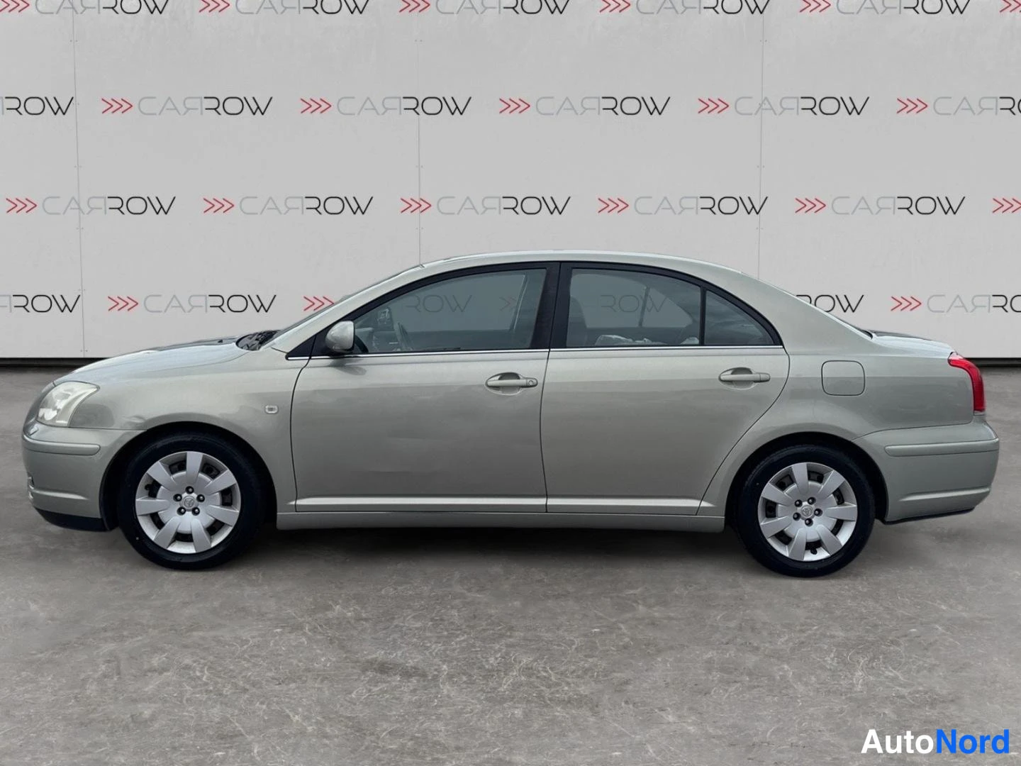 Vihreä Toyota Avensis 2004, sivulta, kuva 5