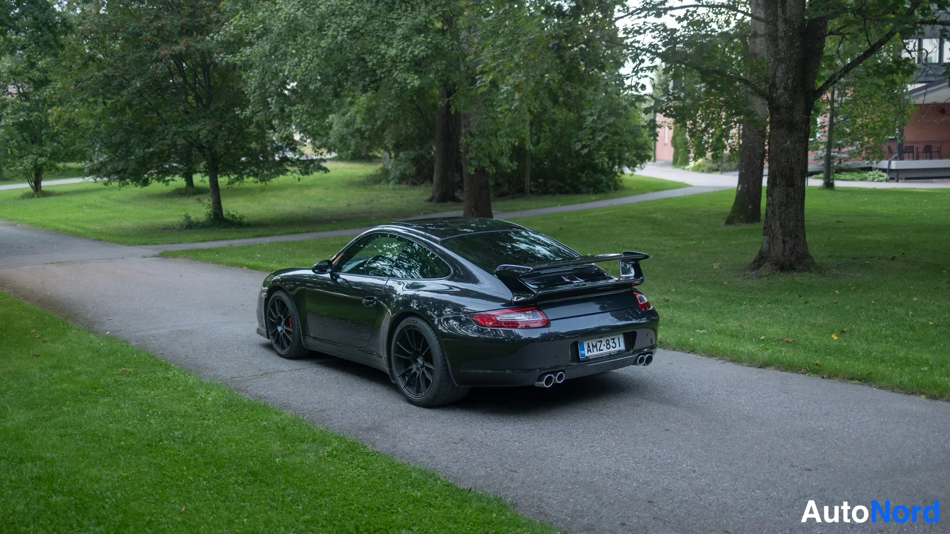 Musta Porsche 911 Carrera 4S 2006, takaviisto, kuva 8