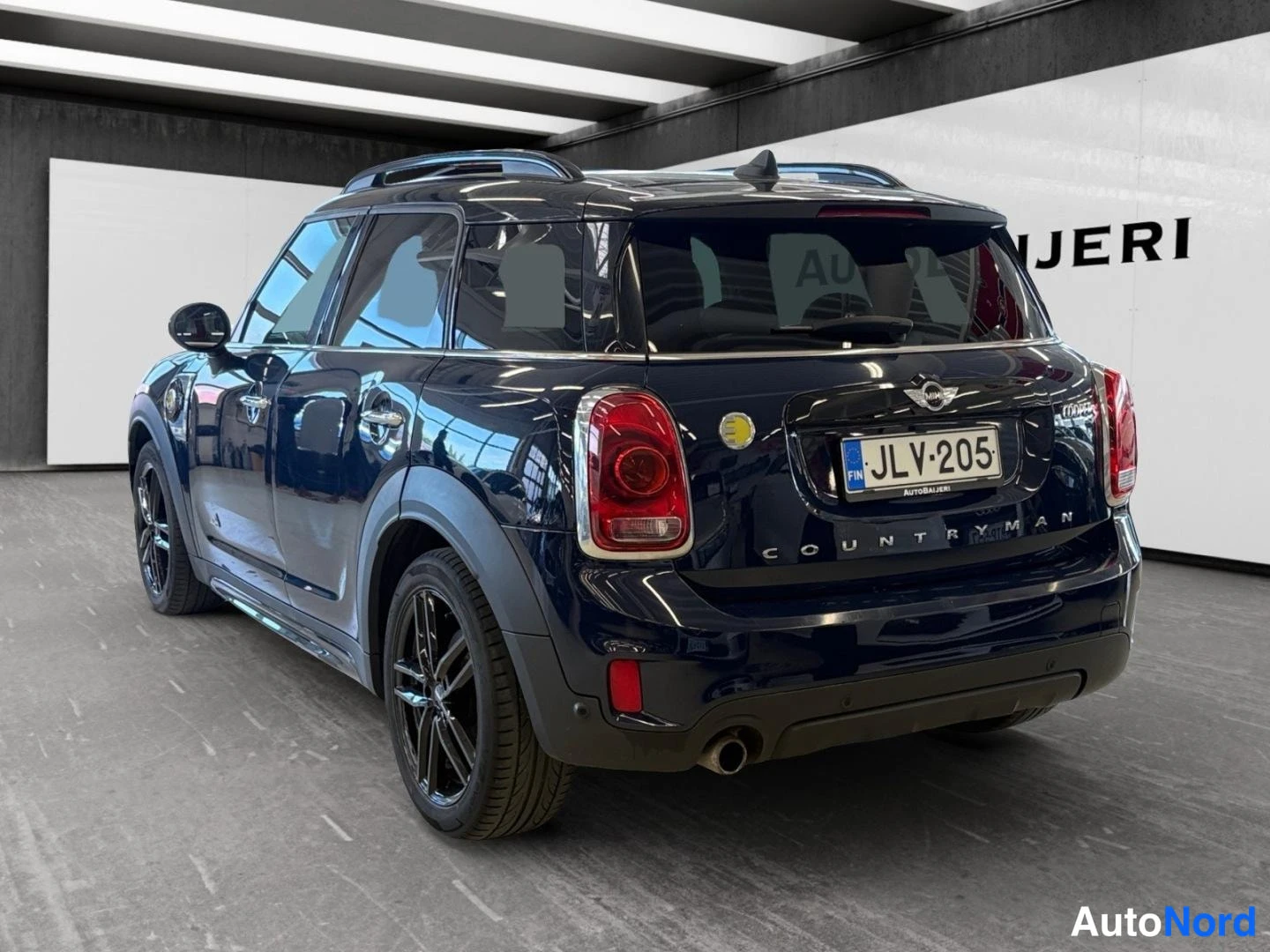 Svart Mini Countryman Cooper SE ALL4 2018, snett bakifrån, bild 7
