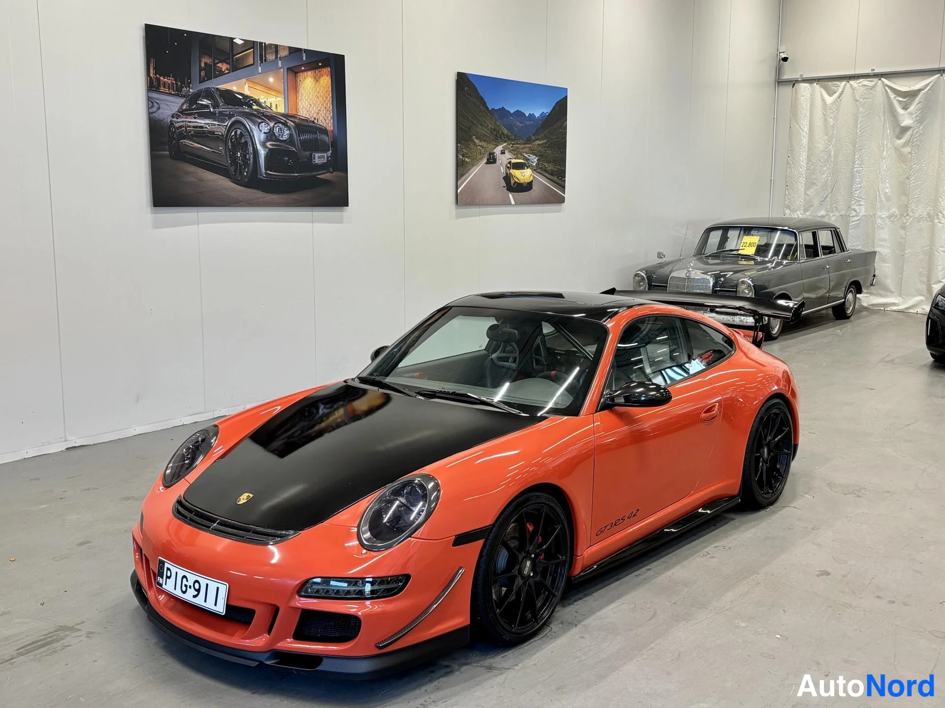 Oranssi Porsche 911 2005, etuviisto, keula vasemmalle, kuva 5