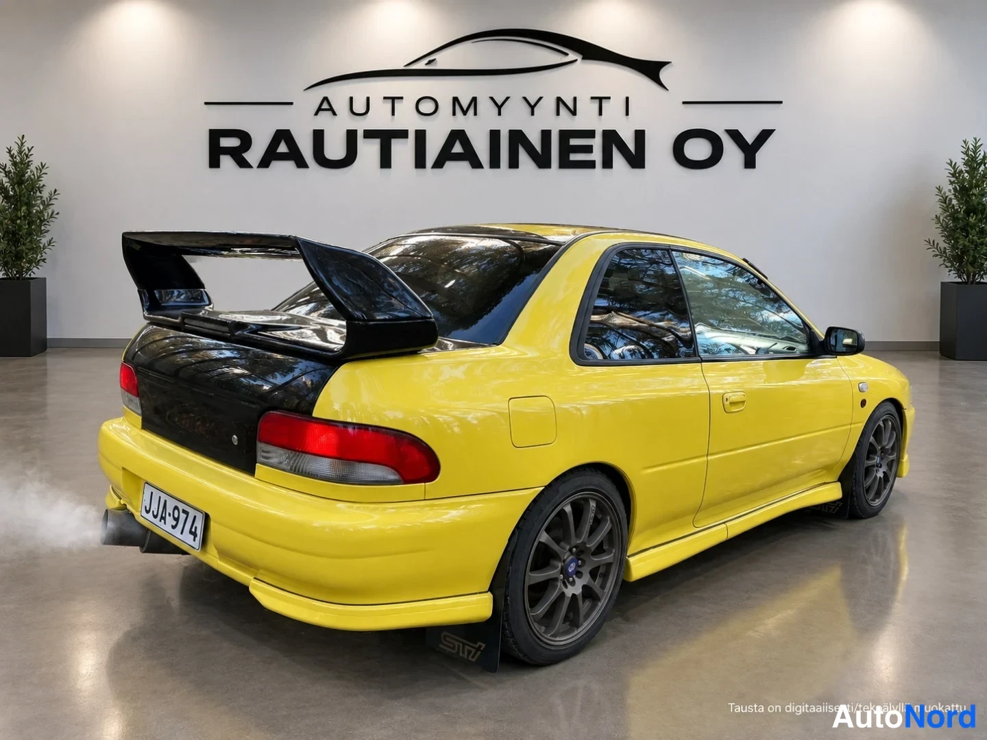 Gul Subaru Impreza 1997, snett bakifrån, bild 5