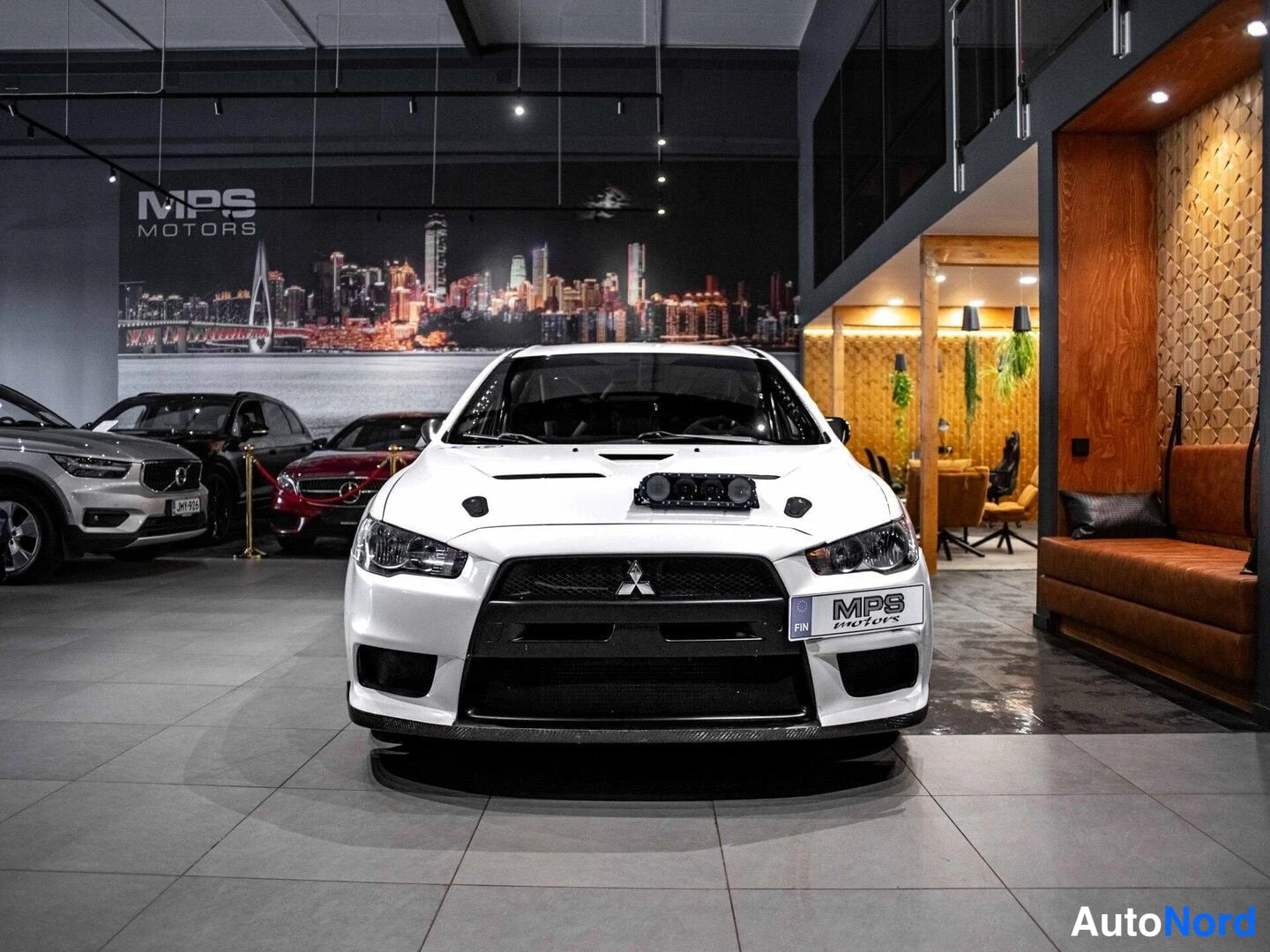 Valkoinen Mitsubishi Lancer 2009, edestä, kuva 5