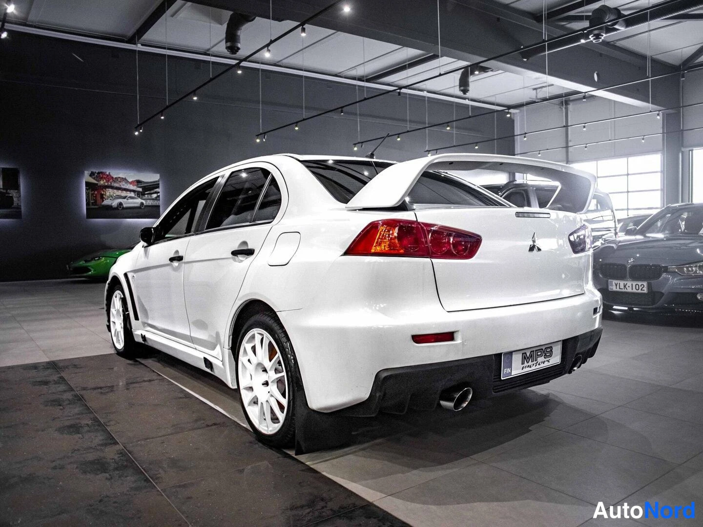 Valkoinen Mitsubishi Lancer 2009, takaviisto, kuva 7
