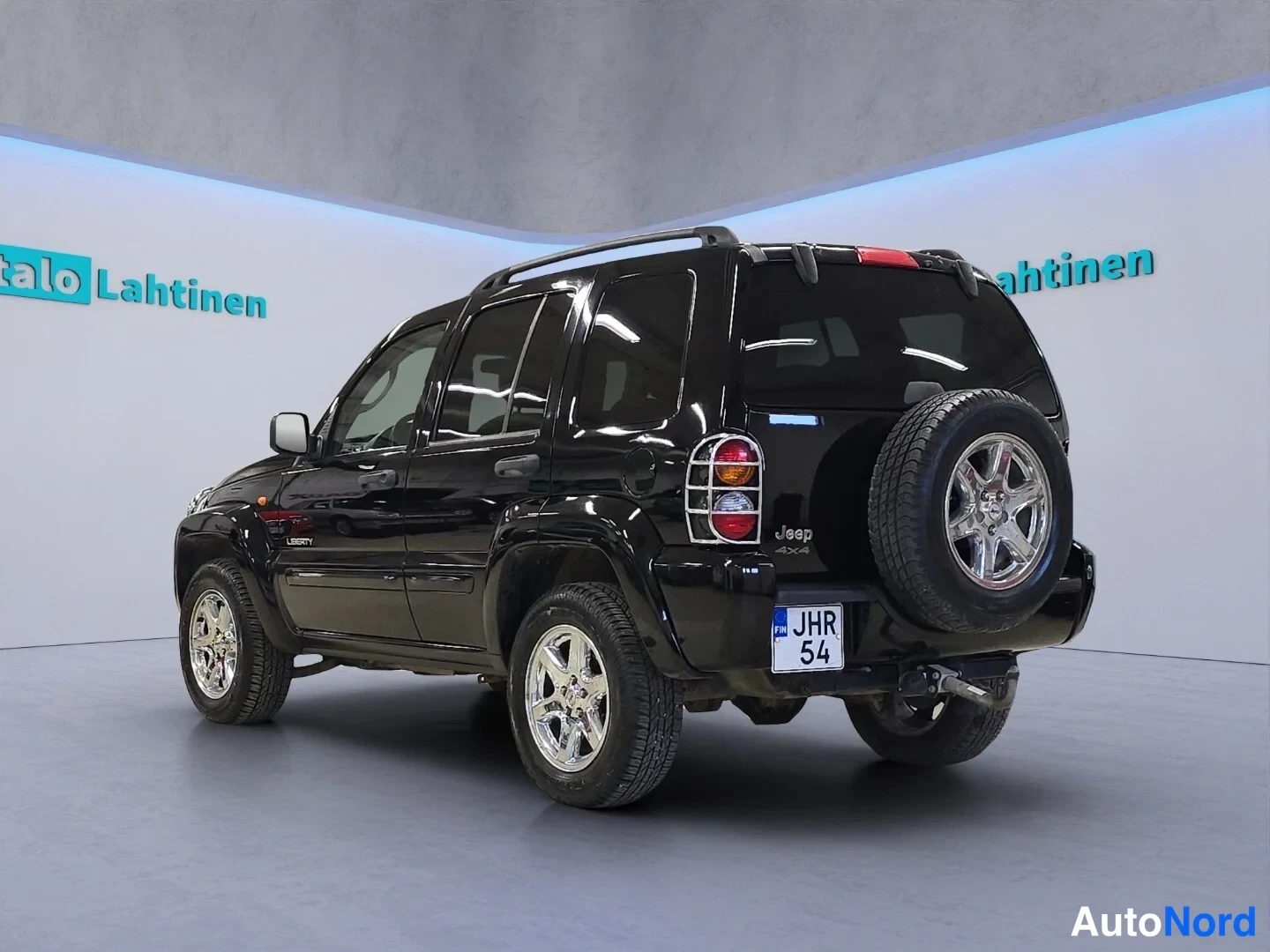 Musta Jeep Cherokee 2003, takaviisto, kuva 6