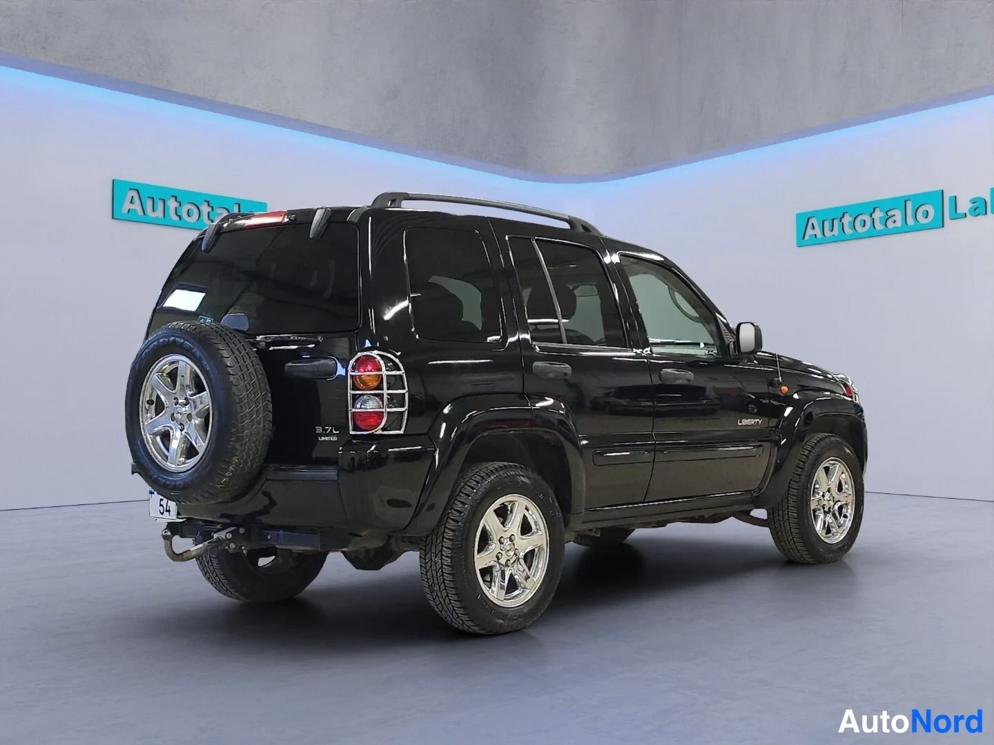 Musta Jeep Cherokee 2003, takaviisto, kuva 7