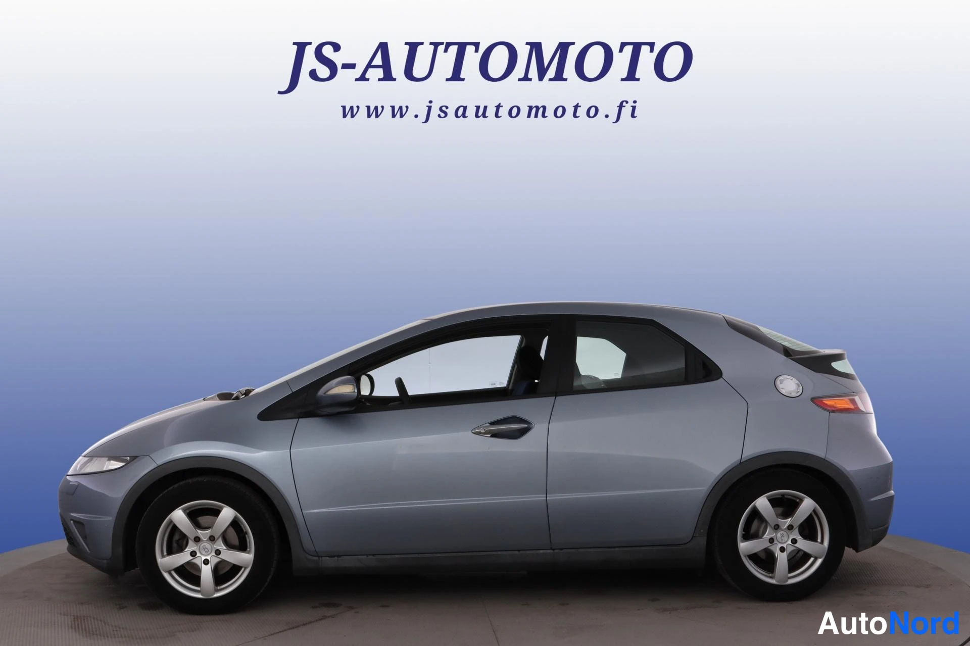 Blå Honda Civic 2007, snett framifrån, fronten åt vänster, bild 2