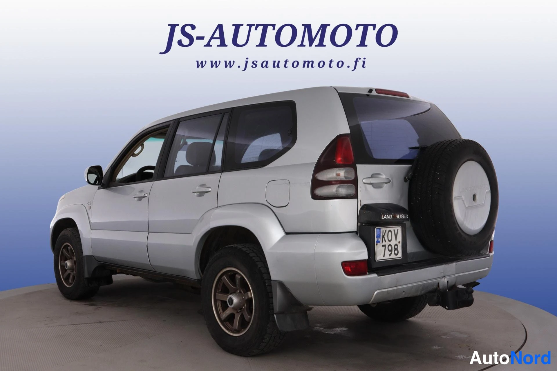 Harmaa Toyota Land Cruiser 2003, takaviisto, kuva 6