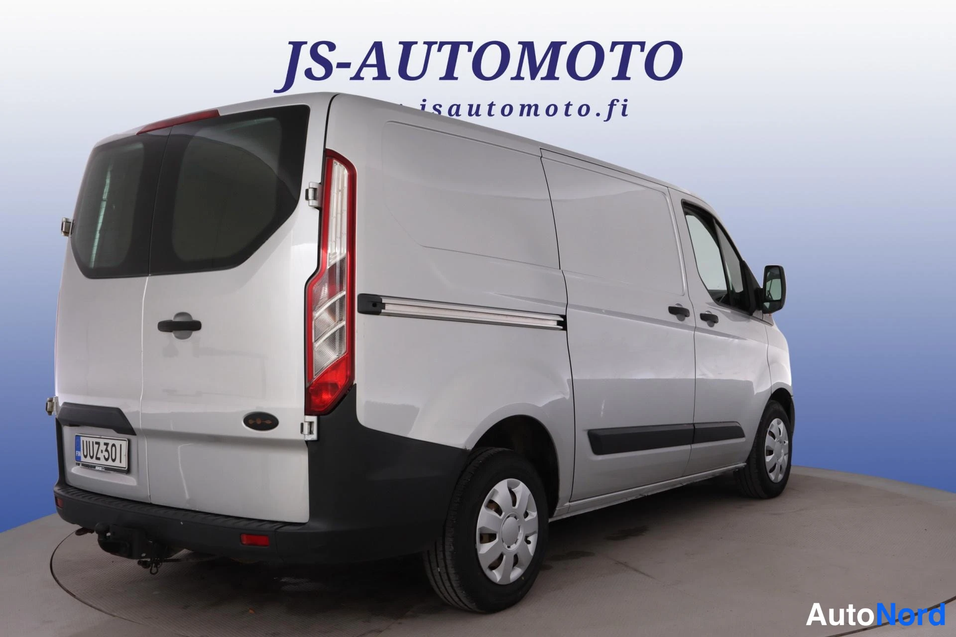 Grå Ford Transit Custom 2013, snett bakifrån, bild 5