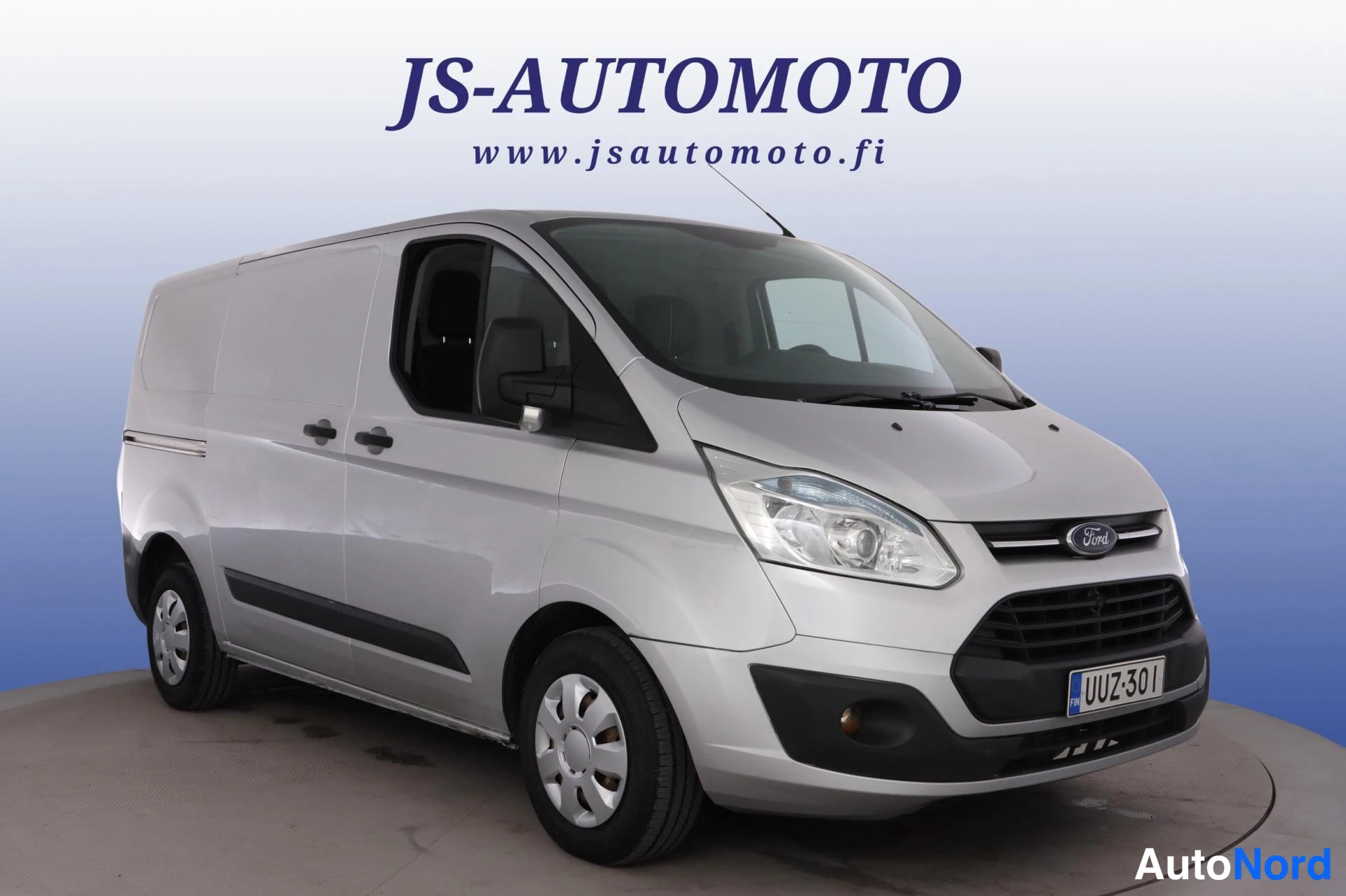 Grå Ford Transit Custom 2013, snett framifrån, fronten åt höger, bild 4