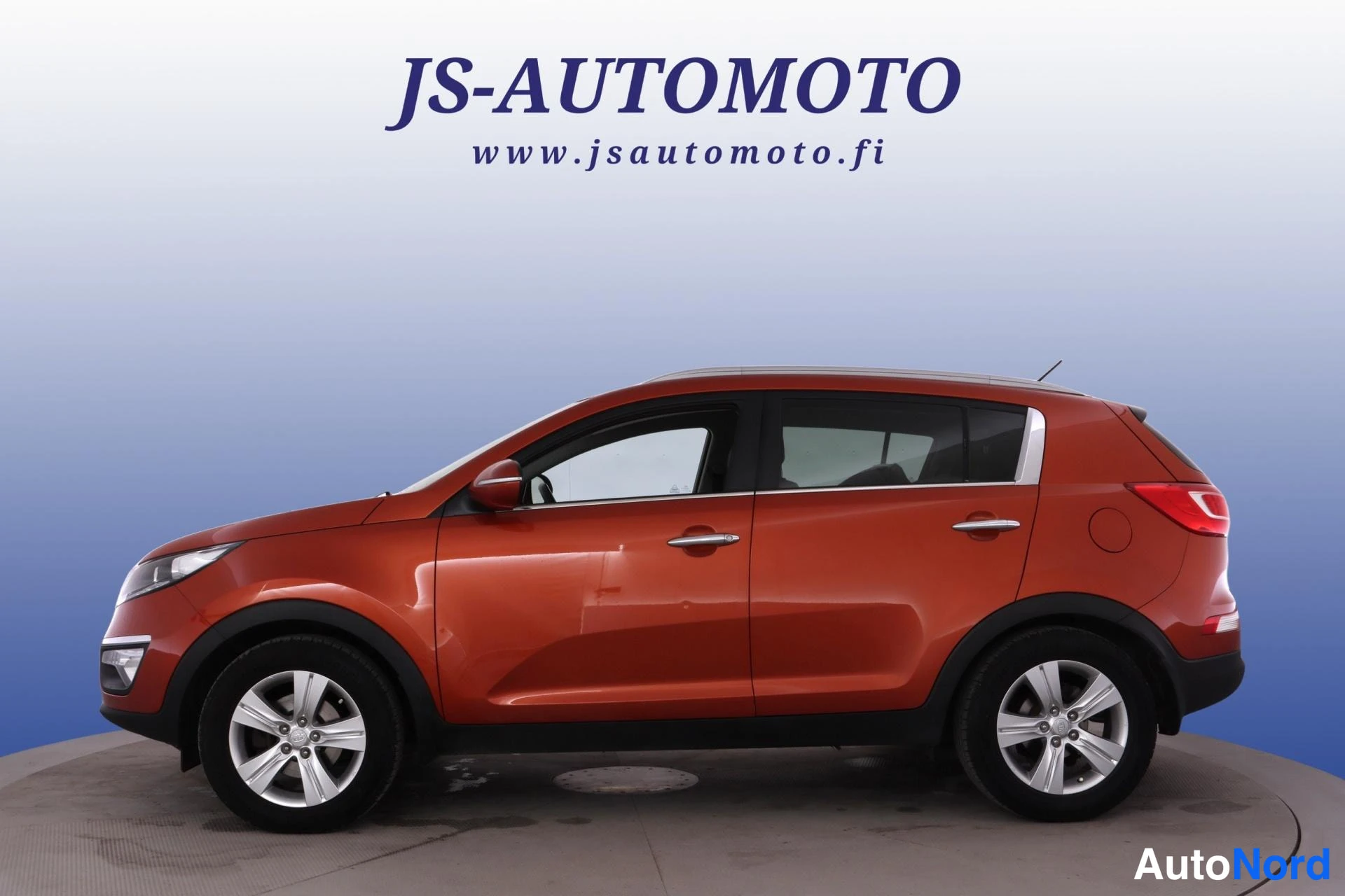 Oranssi Kia Sportage 2013, etuviisto, keula vasemmalle, kuva 2