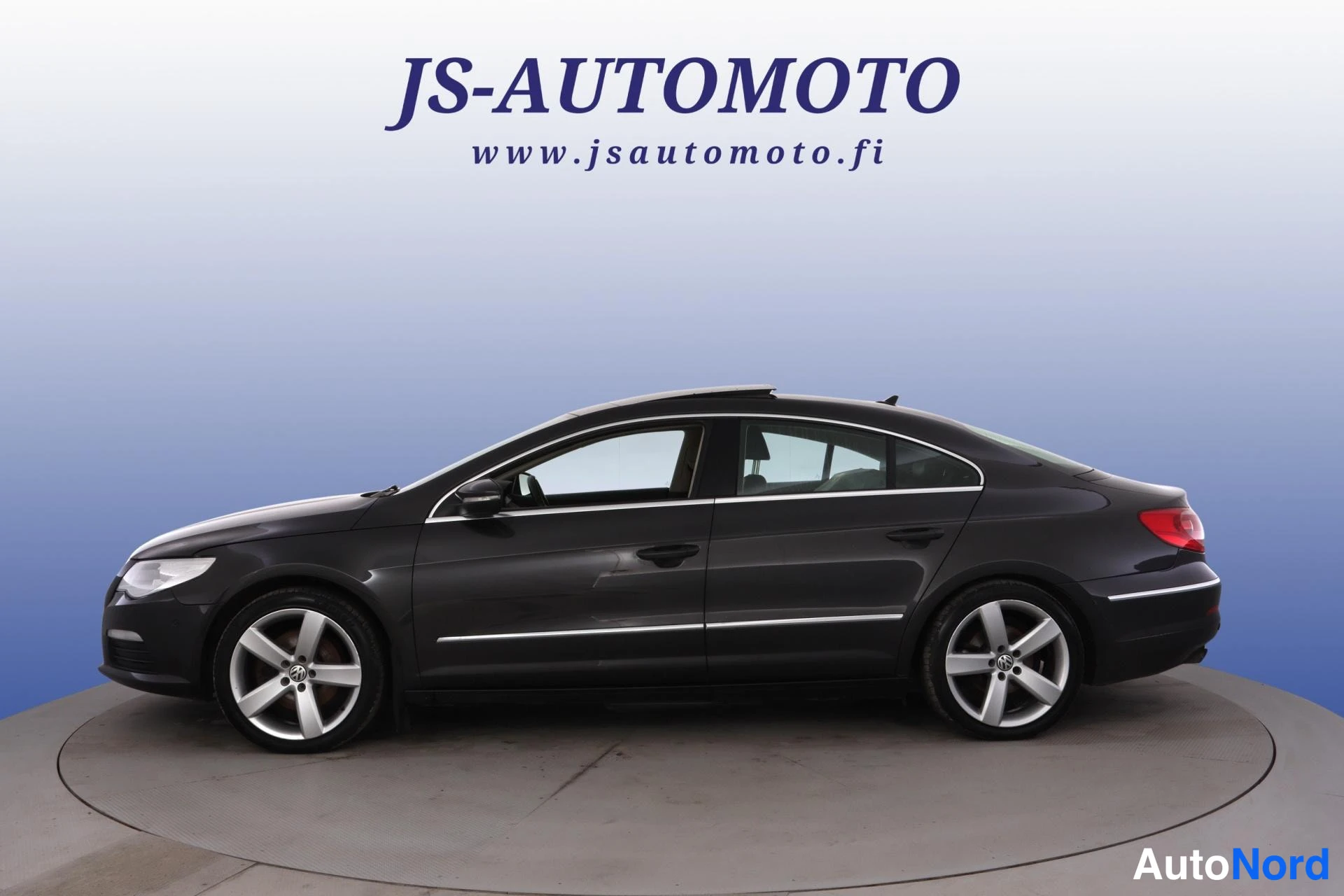 Musta Volkswagen Passat CC 2009, etuviisto, keula vasemmalle, kuva 2