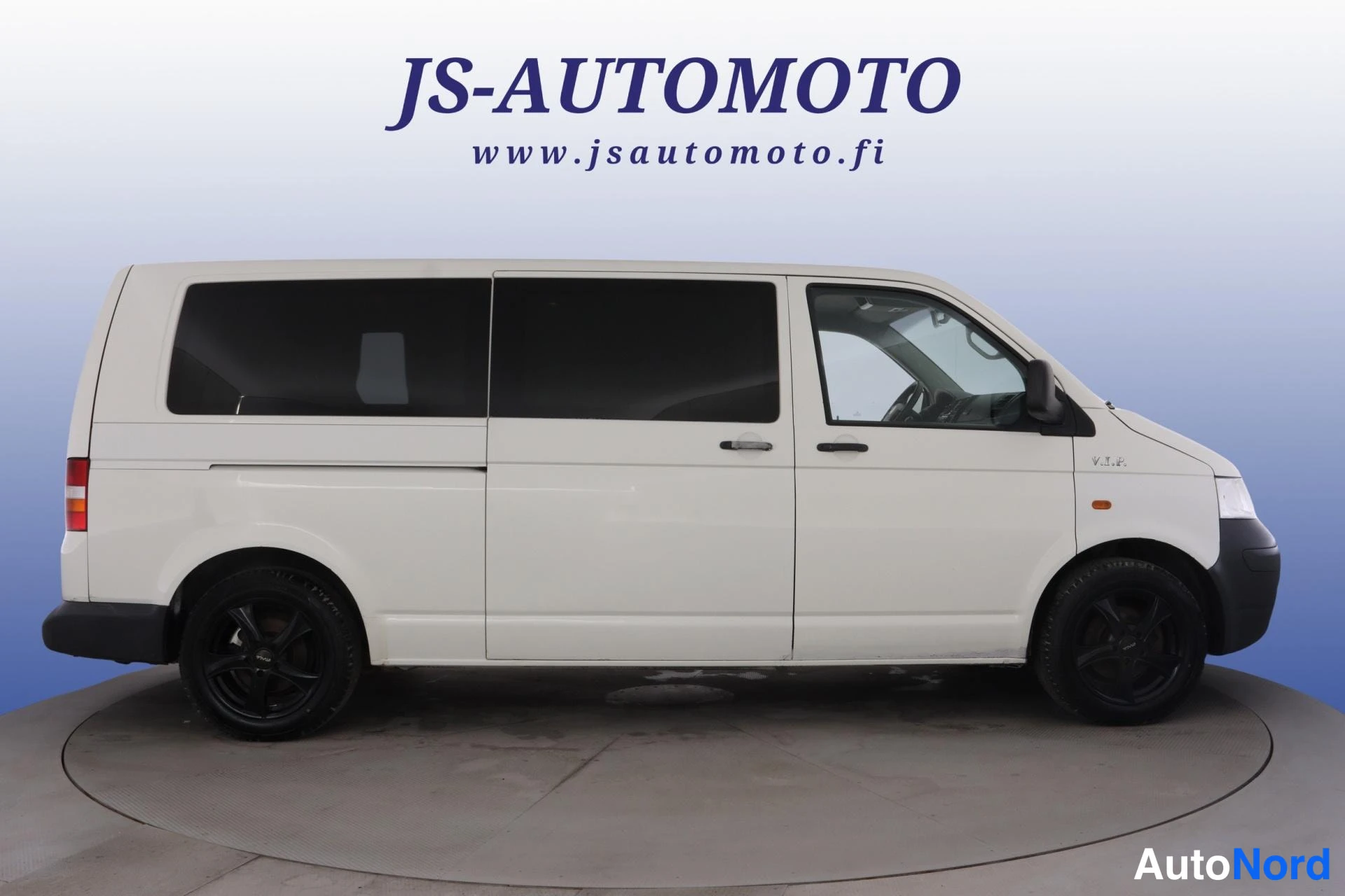 Valkoinen Volkswagen Caravelle 2004, sivulta, kuva 4