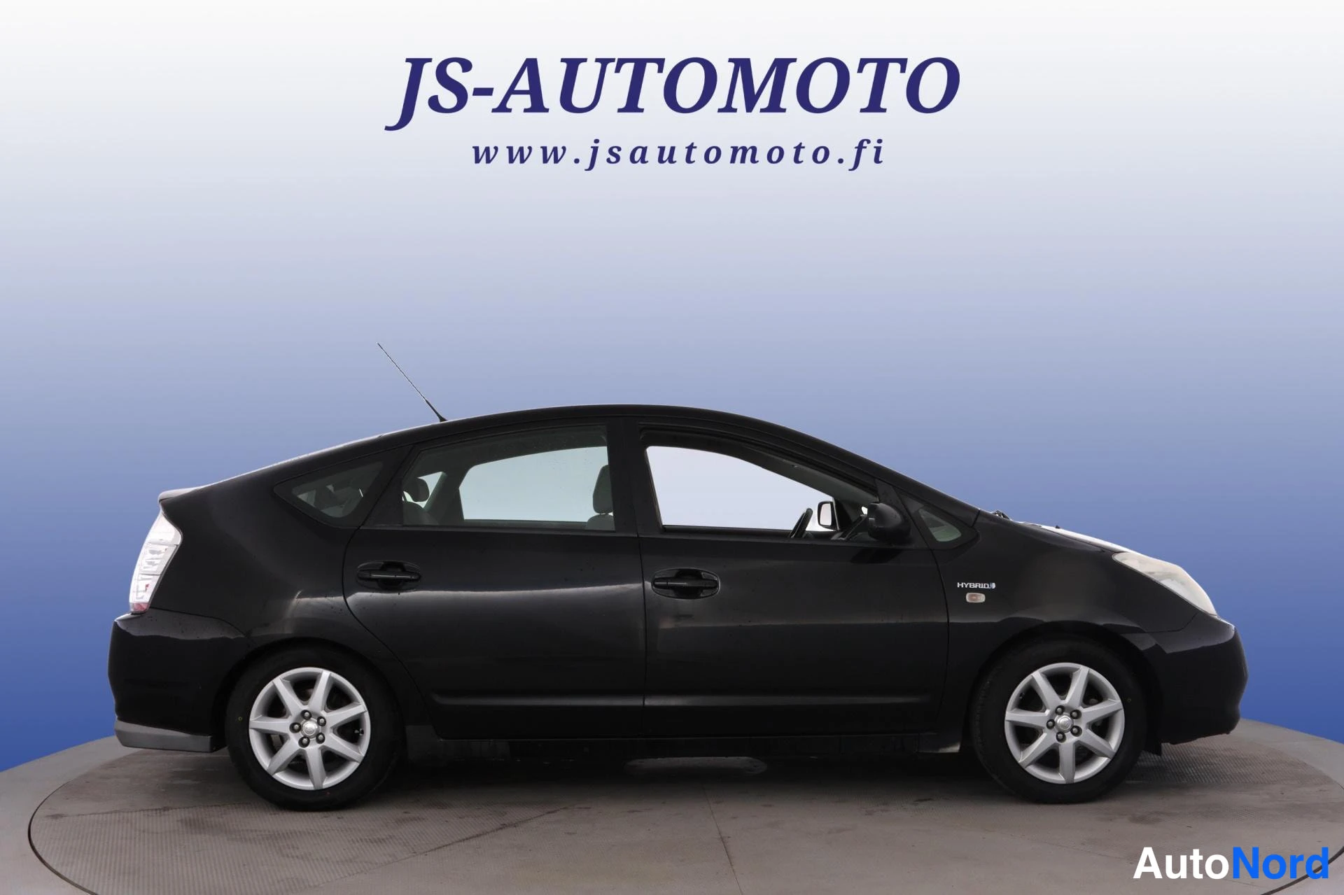Musta Toyota Prius 2009, sivulta, kuva 3