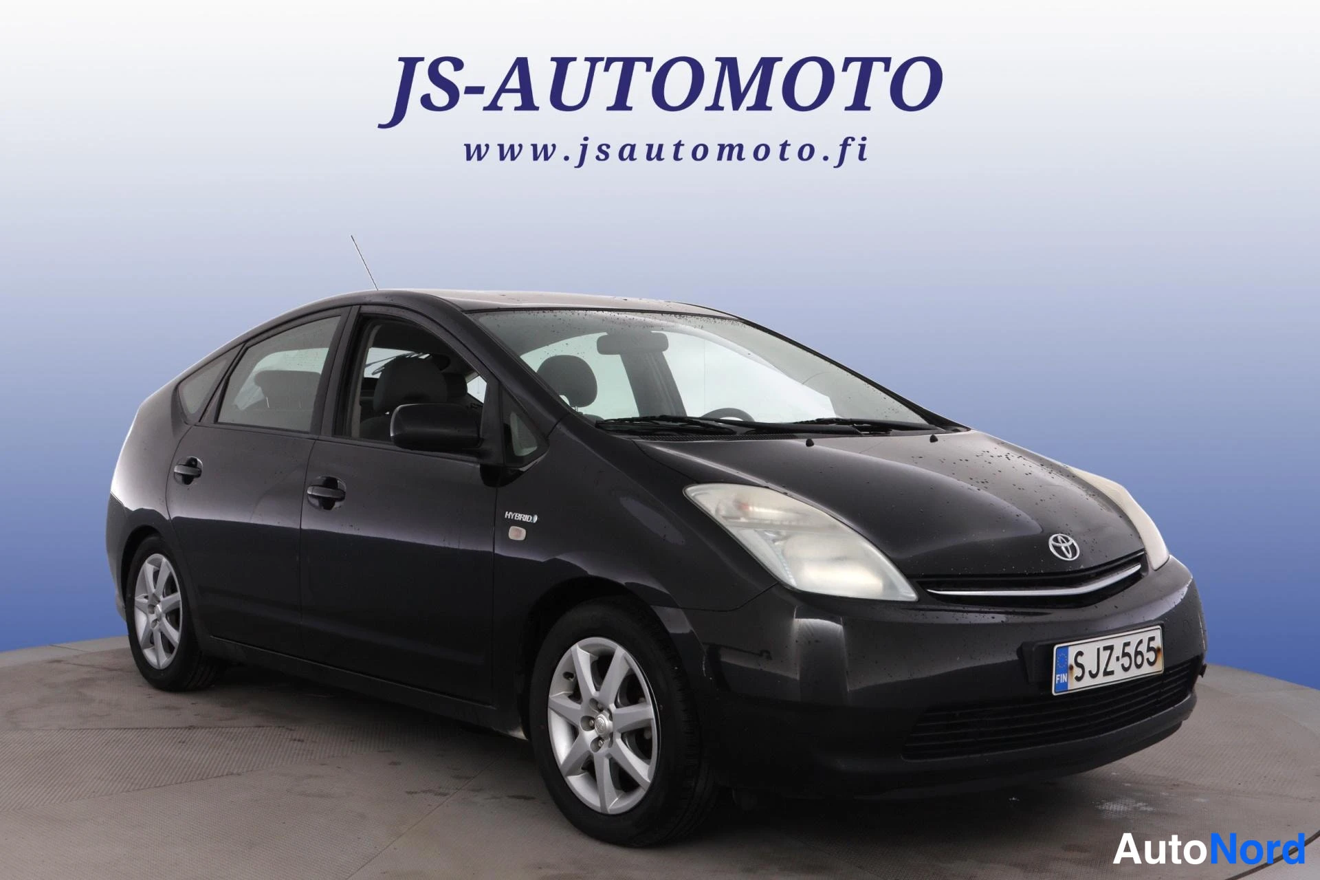 Musta Toyota Prius 2009, etuviisto, keula oikealle, kuva 2