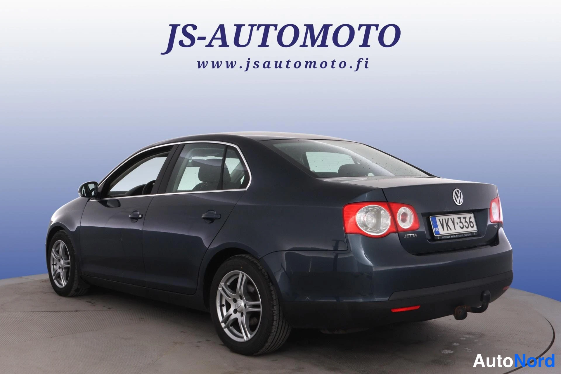 Sininen Volkswagen Jetta 2007, takaviisto, kuva 6