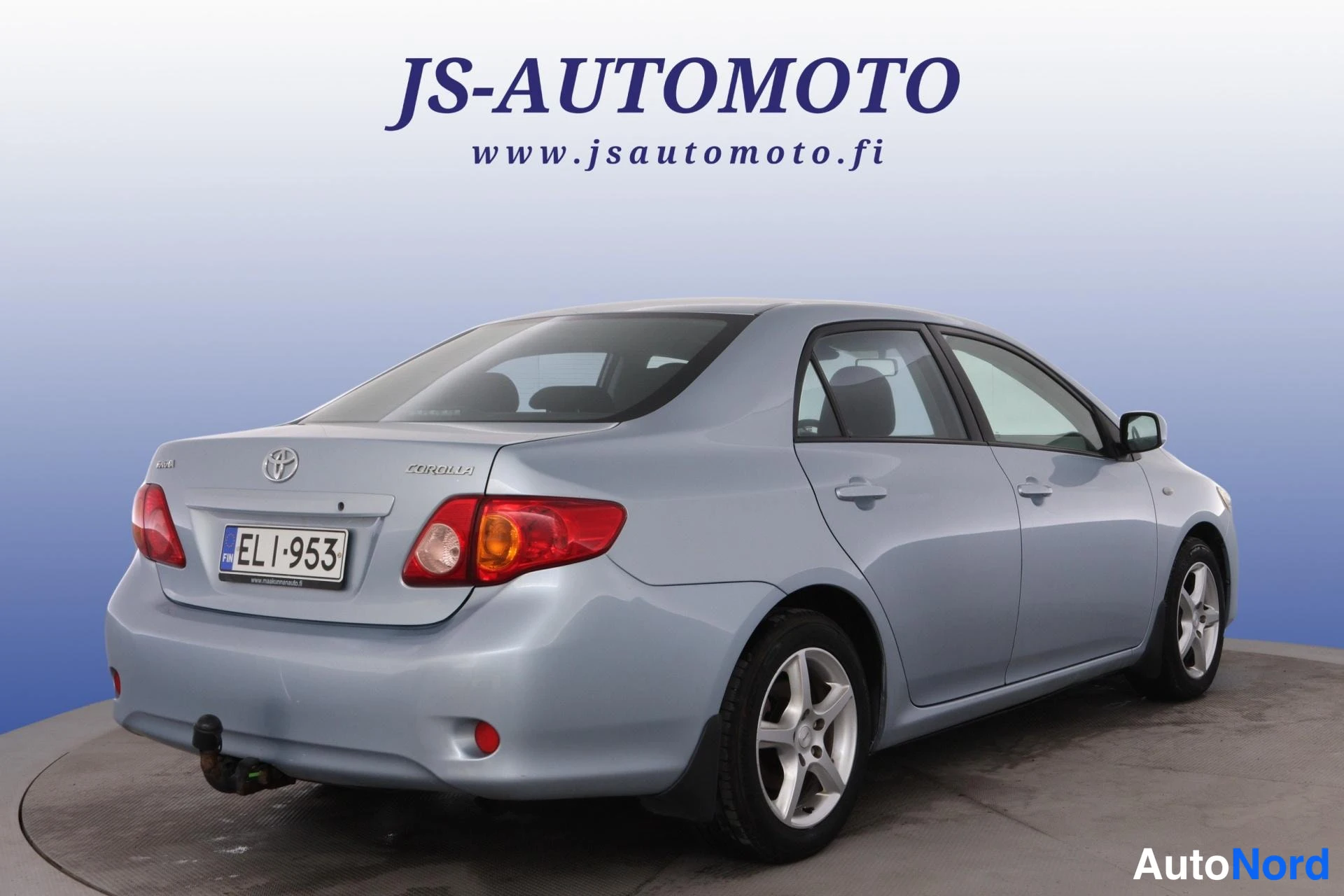 Blå Toyota Corolla 2010, snett bakifrån, bild 5