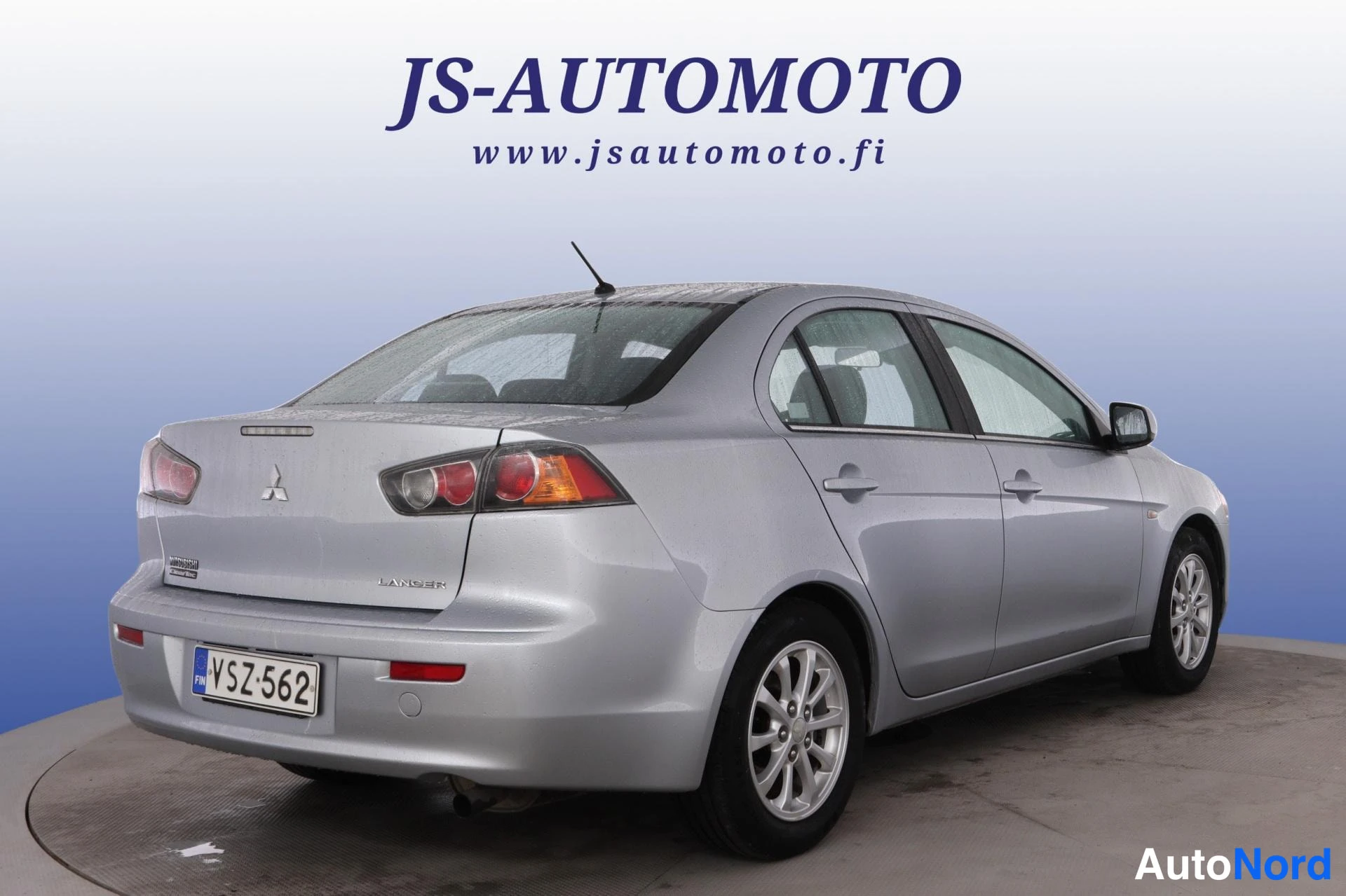 Harmaa Mitsubishi Lancer 2013, takaviisto, kuva 5