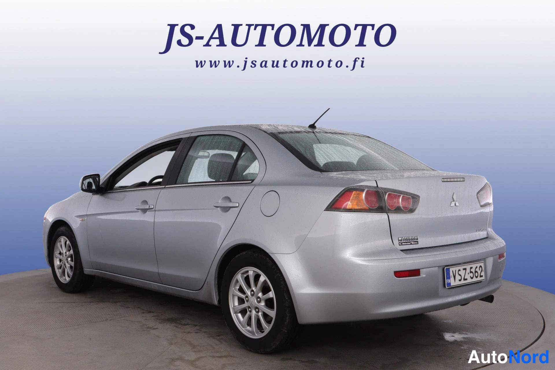 Harmaa Mitsubishi Lancer 2013, takaviisto, kuva 6