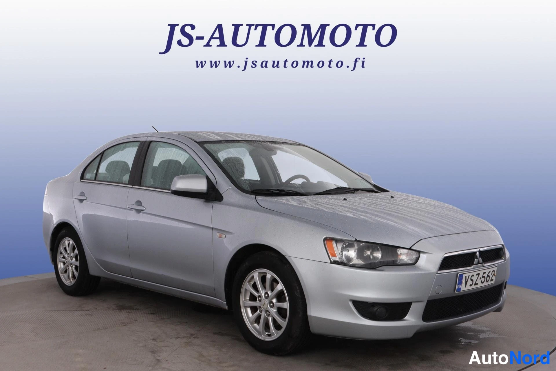 Harmaa Mitsubishi Lancer 2013, etuviisto, keula oikealle, kuva 2