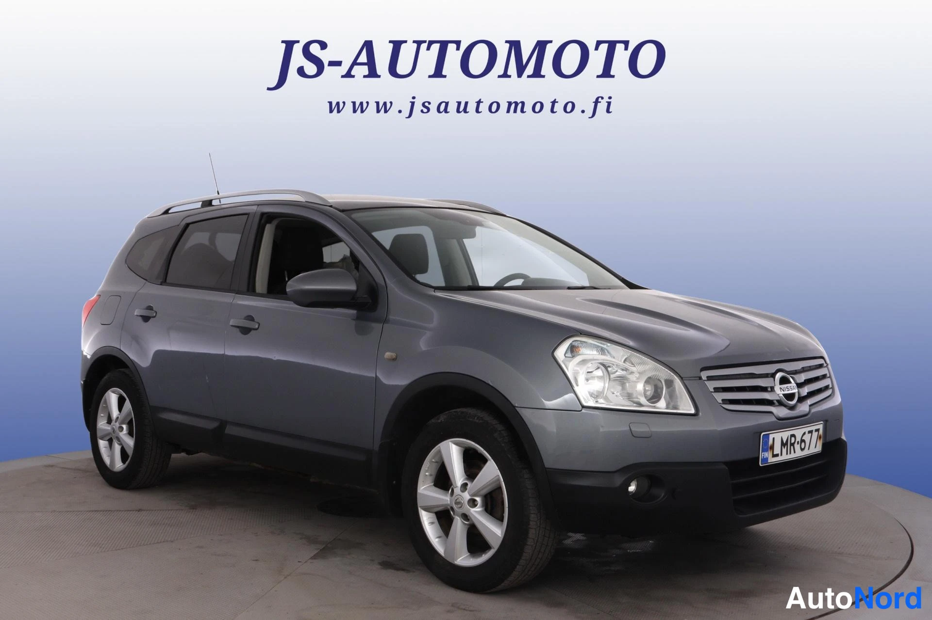 Sininen Nissan Qashqai+2 2009, etuviisto, keula oikealle, kuva 2